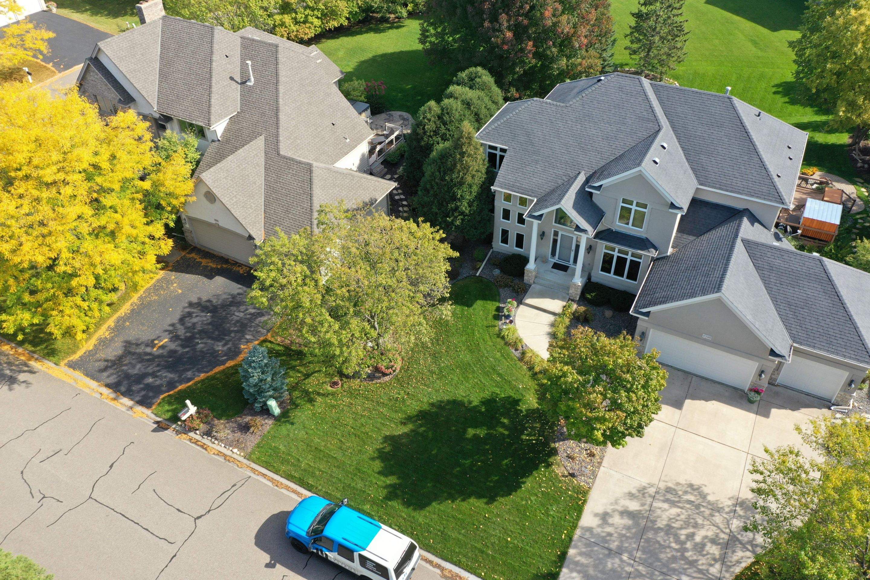 Residential Roofing Installation using Certainteed Landmark Moire Black by MODERN EXTERIOR SYSTEMS
