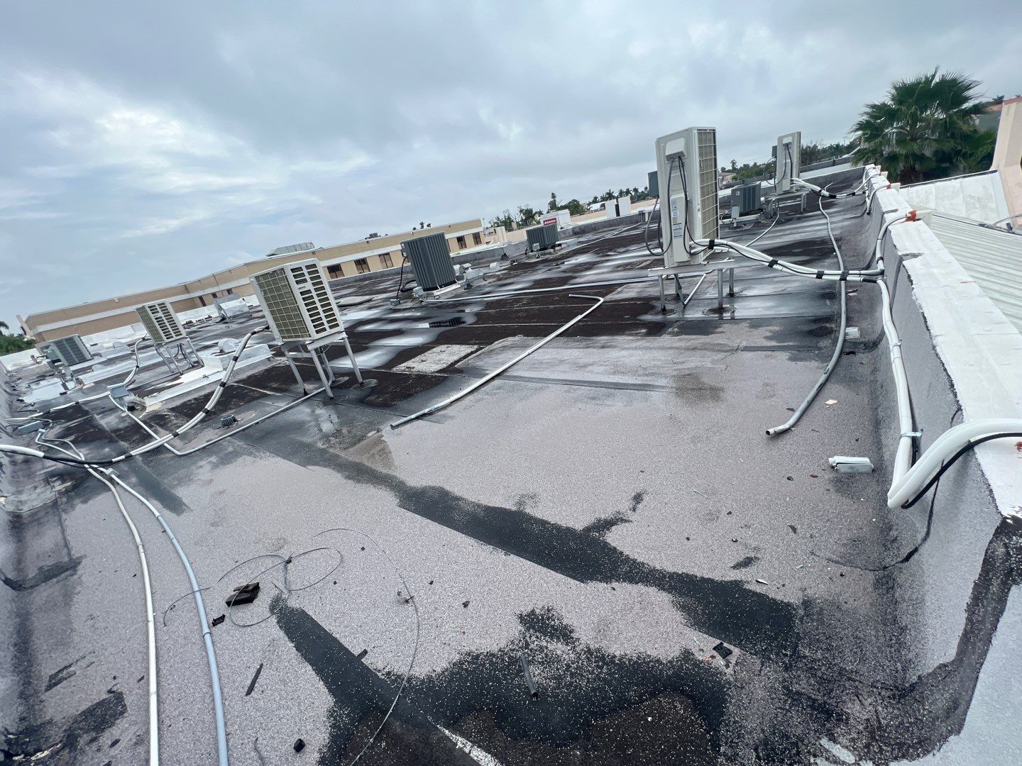 Commercial Roofing Repair using Roof Sealant by Four Peaks Roofing