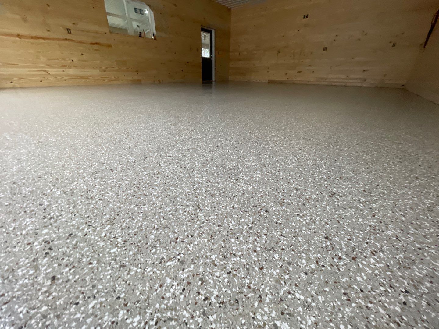 Garage and Carport in Chiefland, FL in Pebble Beach by Cross Creek Concrete Coatings