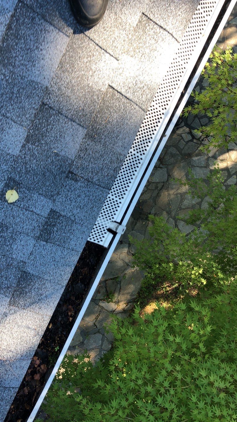 Gutter Cleaning by American Home Contractors