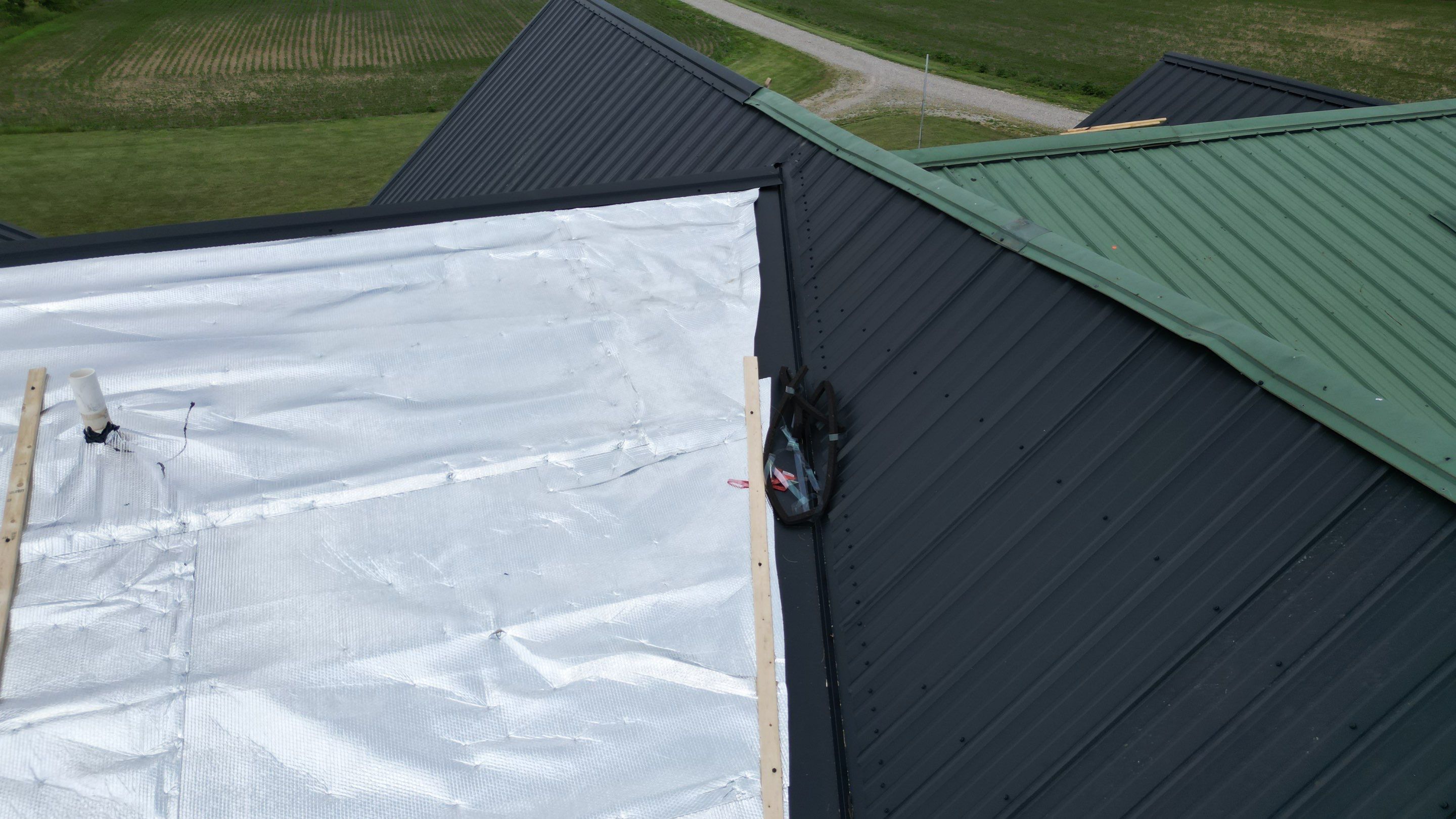 Residential Roofing Installation using Performance Panel Metal - Frost Black by RoofX 