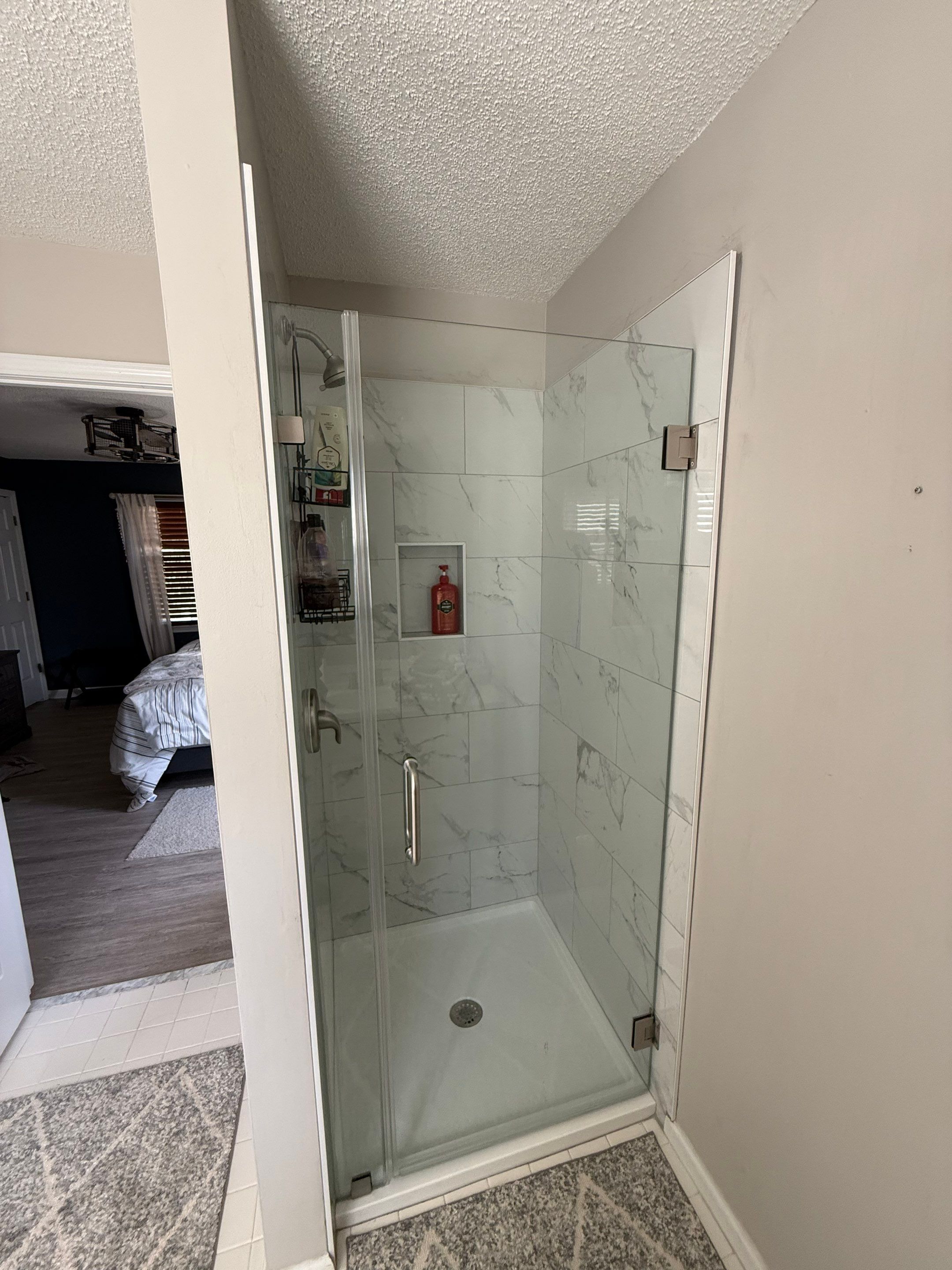 Walk-In Shower Renovation with Marble Tile in Powder Springs by Swift Home Renovations