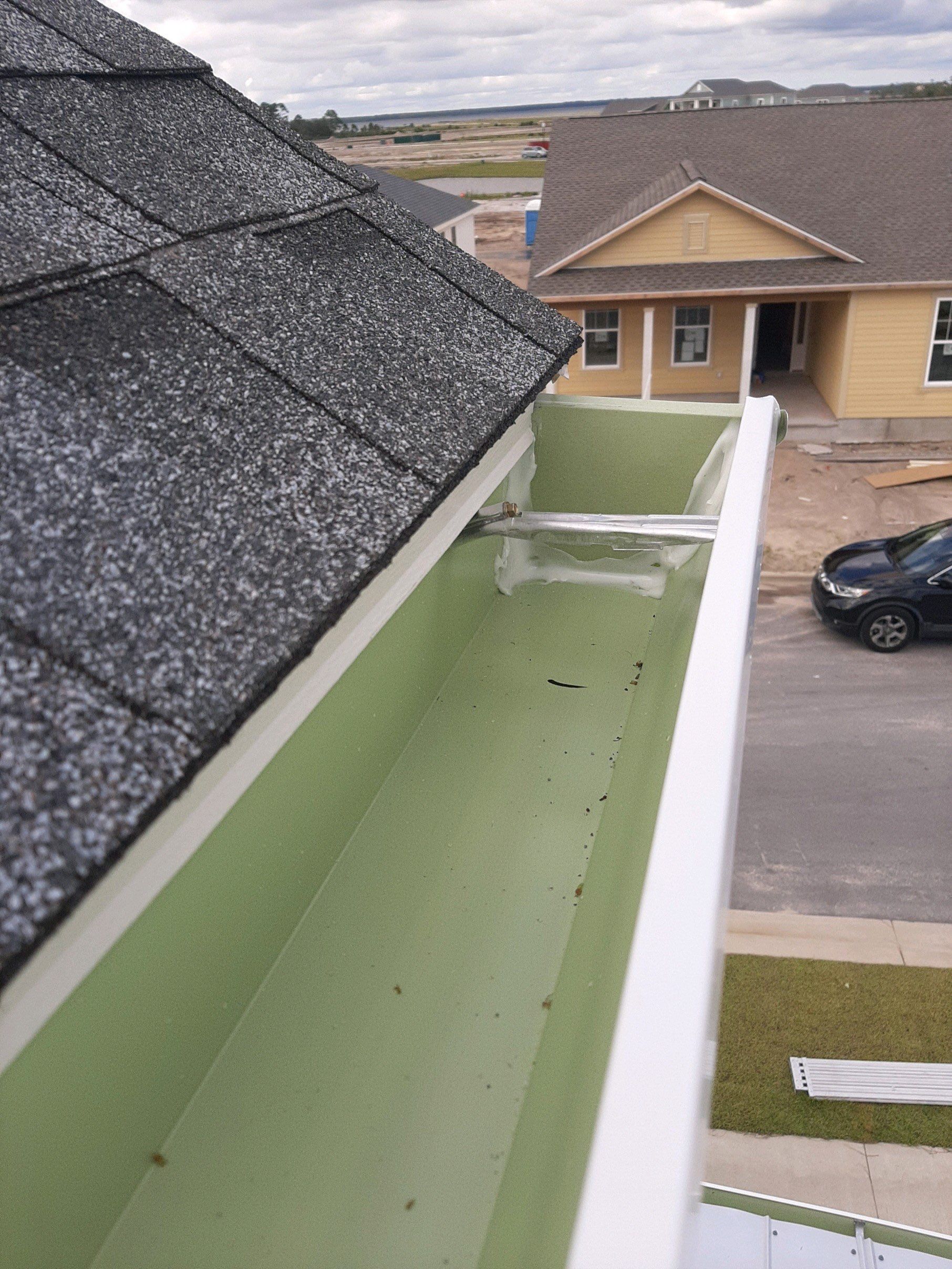 Seamless Gutter Installation using White K-Style Gutters by Gutter Professors
