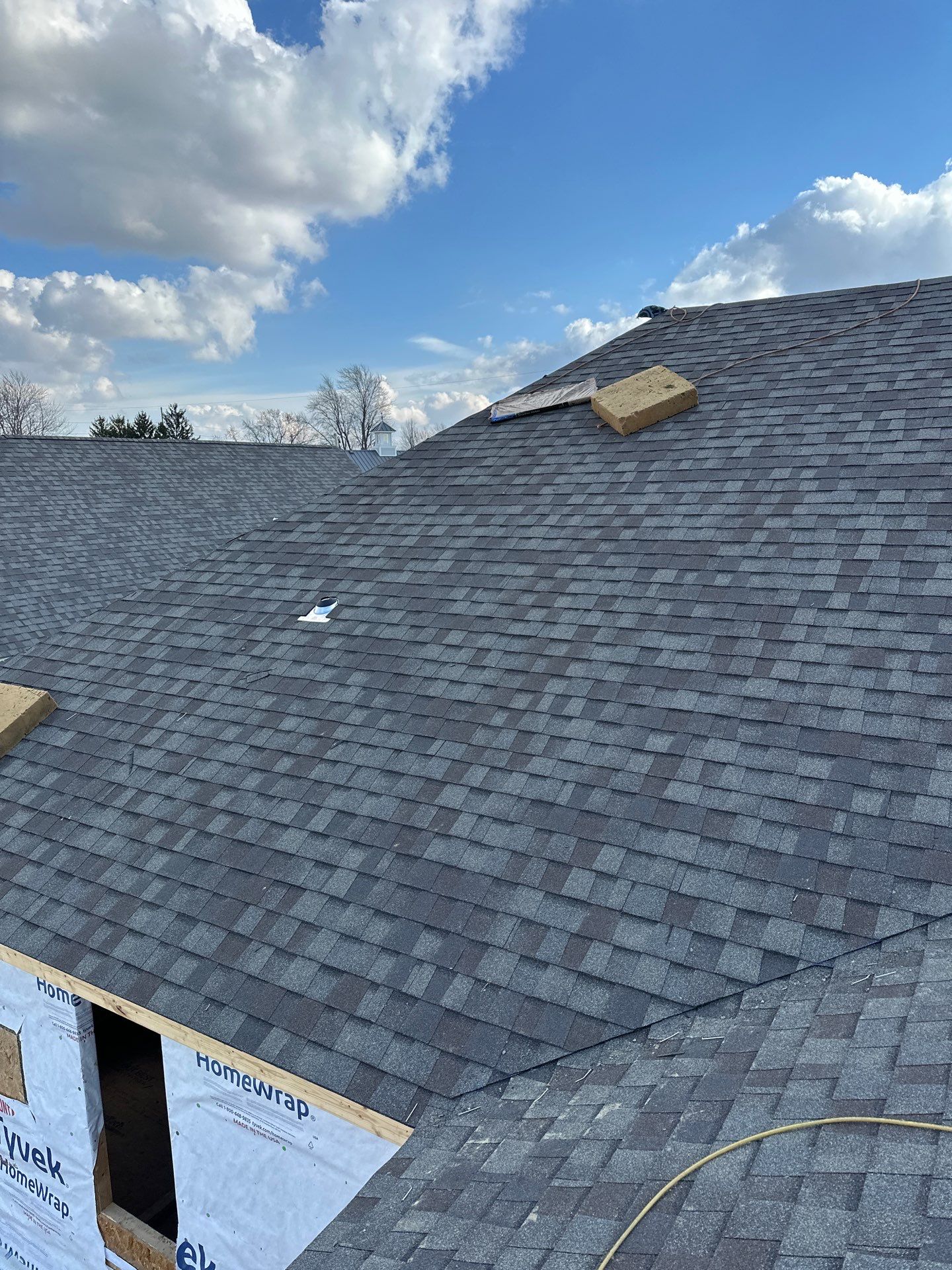 Residential Roofing Installation using CertainTeed Landmark Weathered Wood by Nitro Roofing and Construction