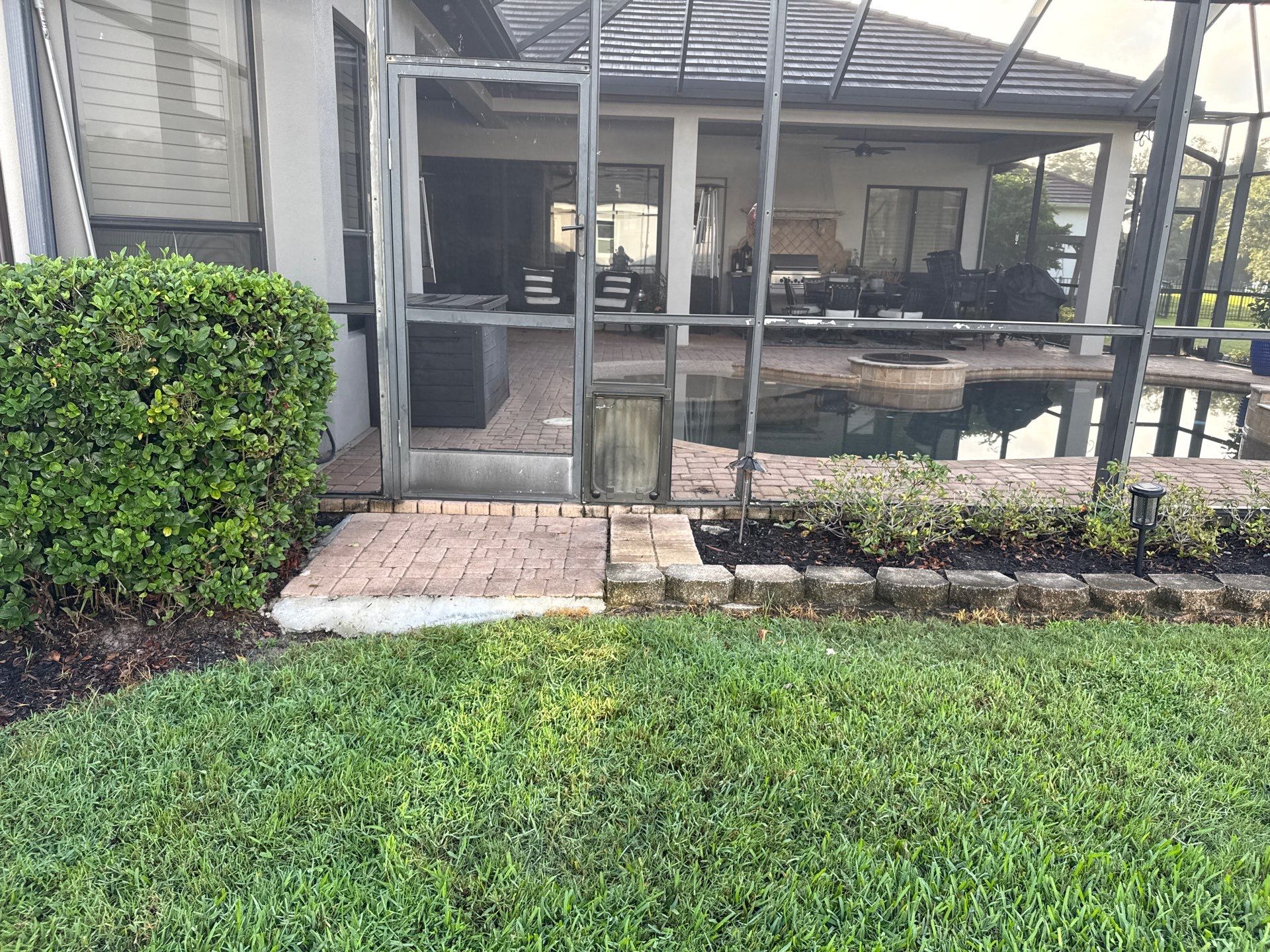 Tile Roof, Paver Pool Deck & Flowerbed Curbing Cleaning | Winding River Bradenton, FL Transformation by Sunshine AquaWash