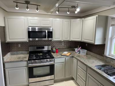 Cabinet Refinishing by Big Pine Panting Inc