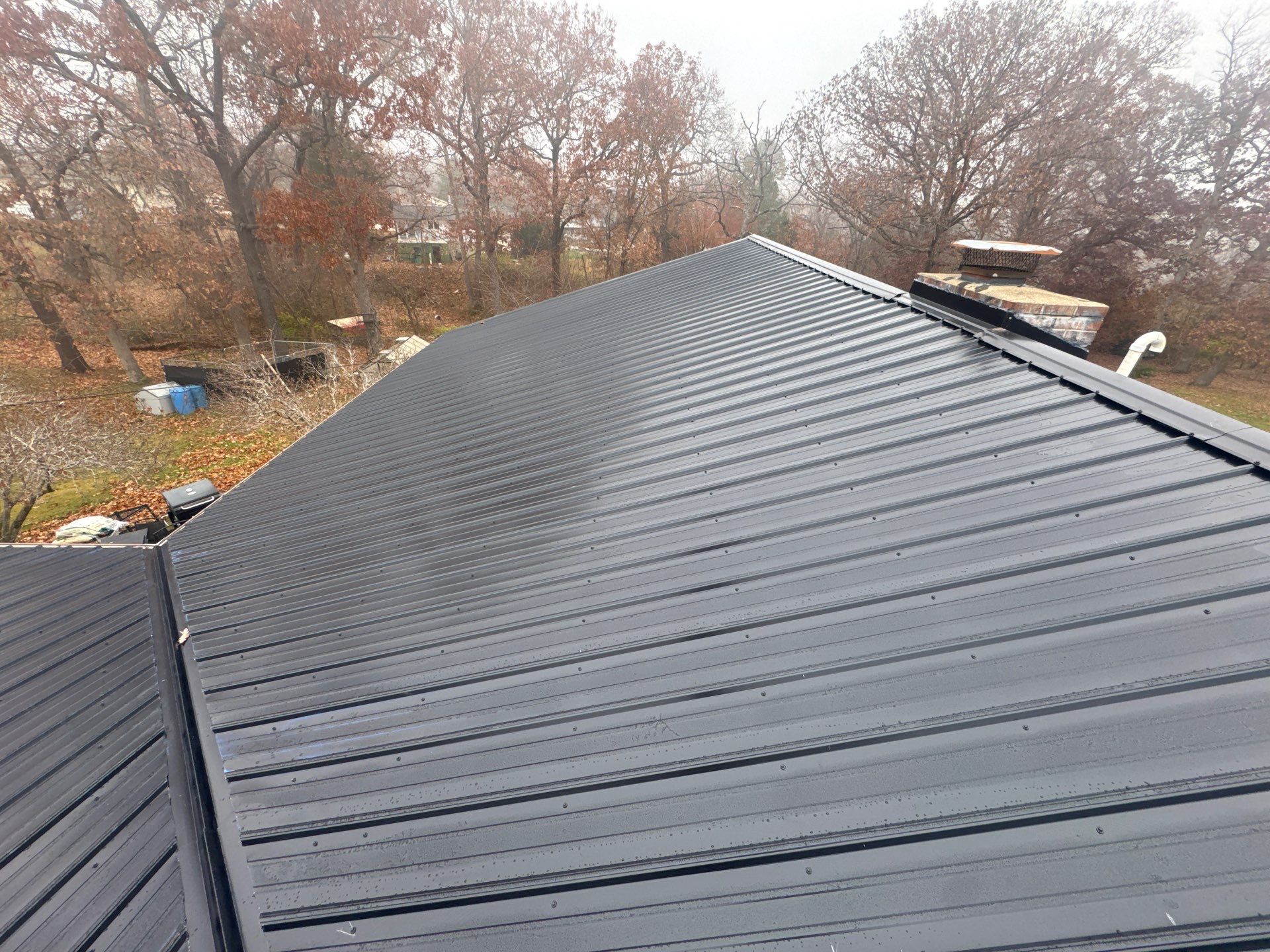 Residential Metal Roof Install - 26 Gauge G-Rib Metal - Color Shiny Black  by Titan Commercial & Residential Roofing 