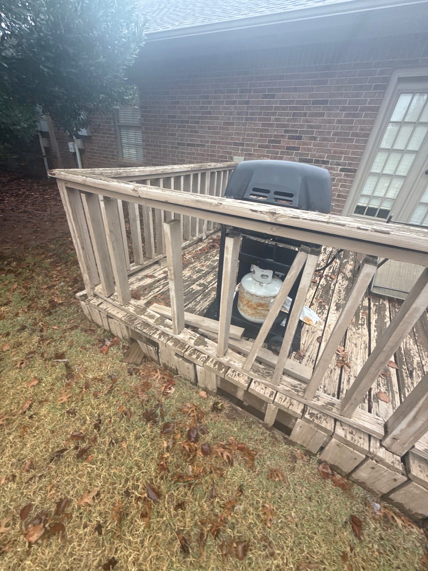 deck removal  by McCann's Roofing and Construction