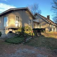 Siding Installation using Perfection Red Western Cedar Shingles  by Loyalty Exterior Solutions 