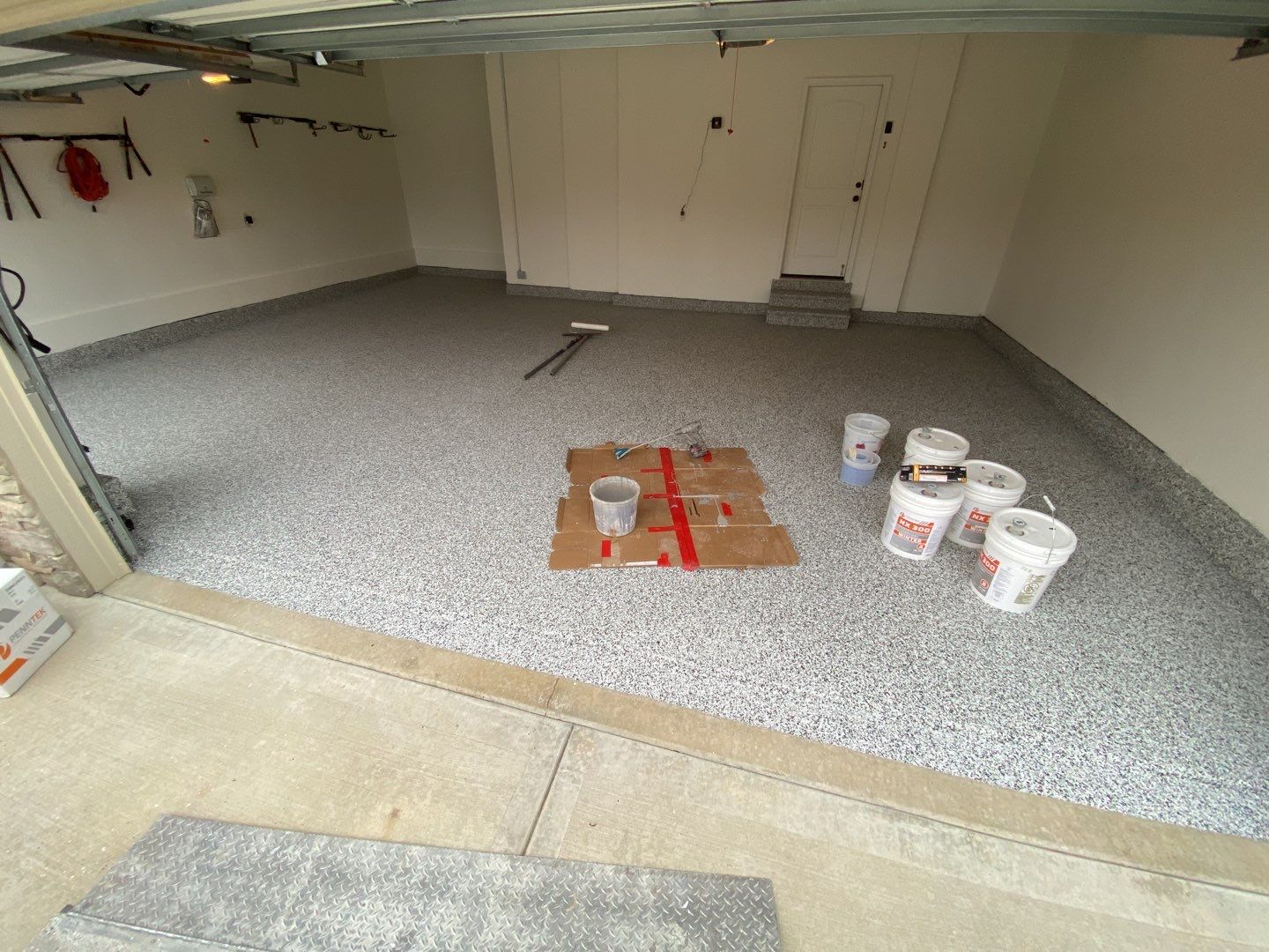 Garage using Domino  by Select Painting, Coatings & Garage Cabinets