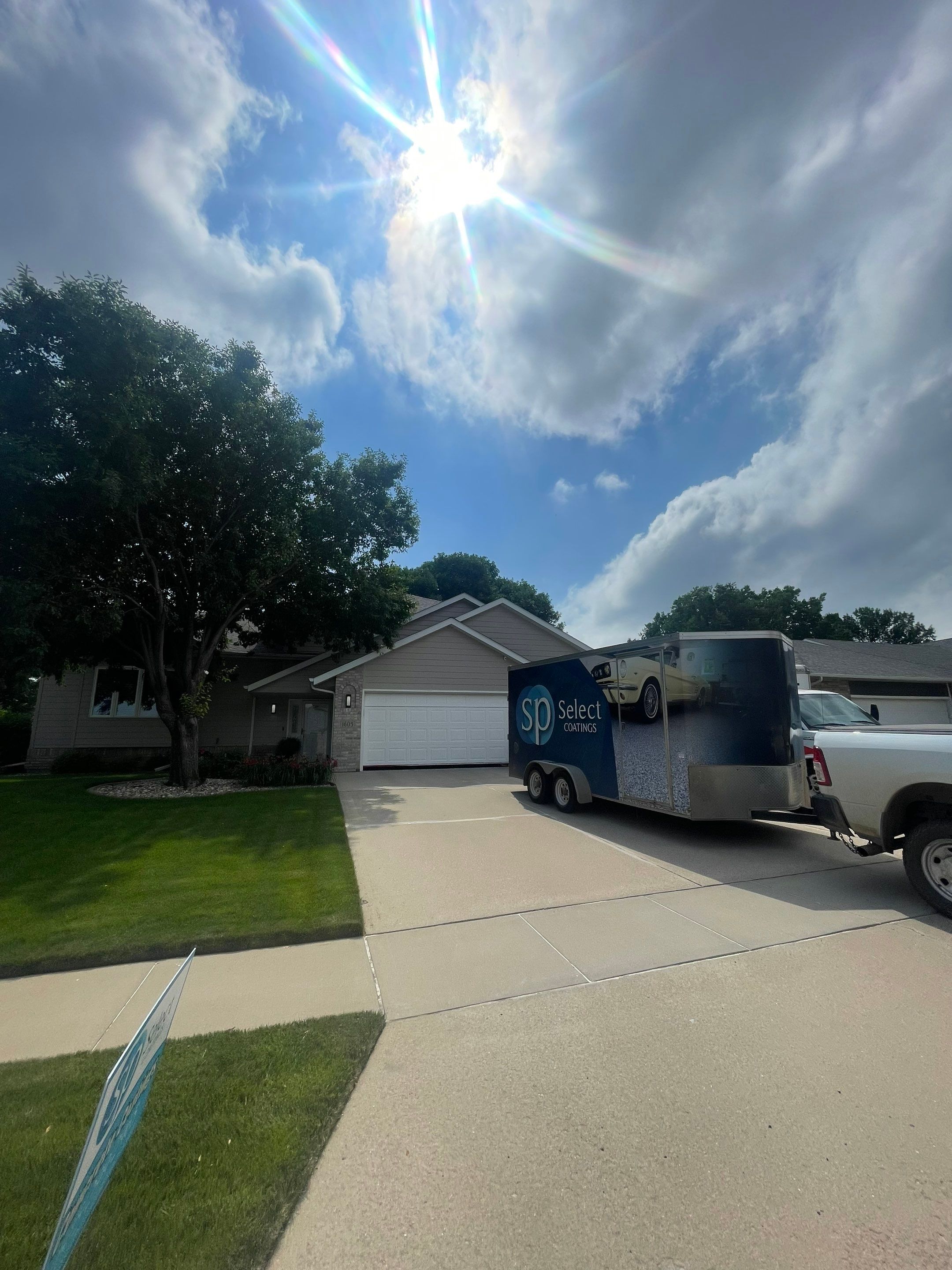 Multi-Car Garage Concrete Coating with Coyote Flake Finish in Sioux Falls by Select Painting, Coatings & Garage Cabinets