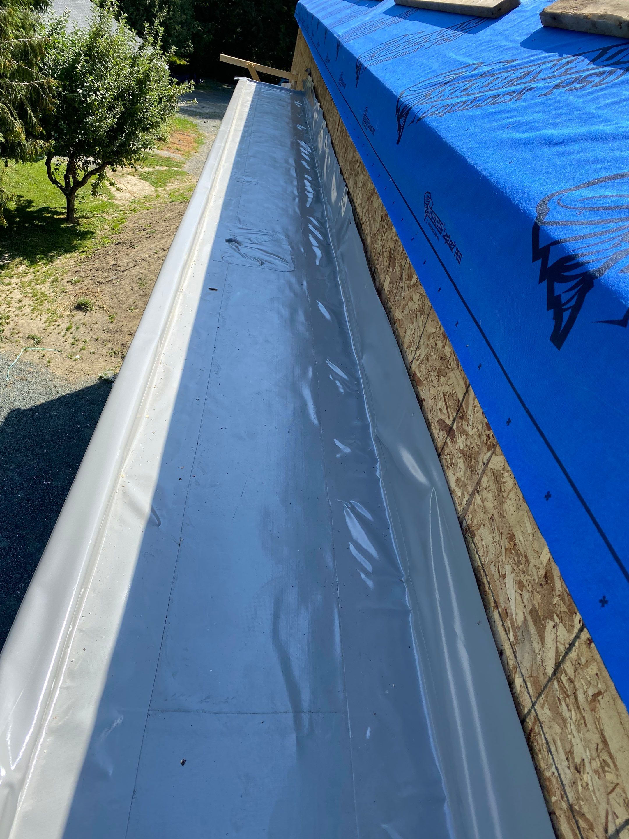 Residential Roofing Installation using multiple products by Top Notch Roofing Inc