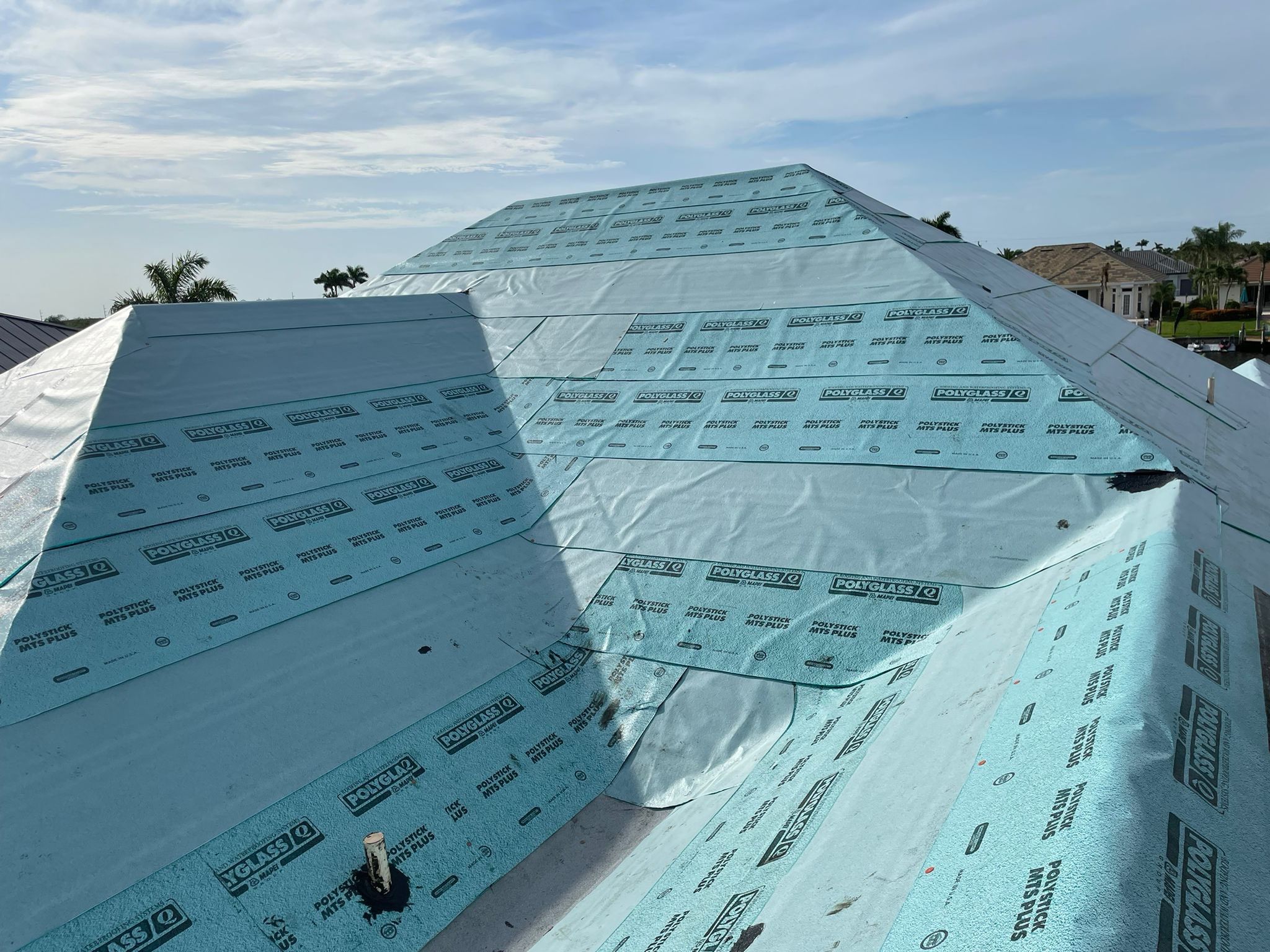 SW Cape Coral Stone Coated Steel Roof Installation by Four Peaks Roofing