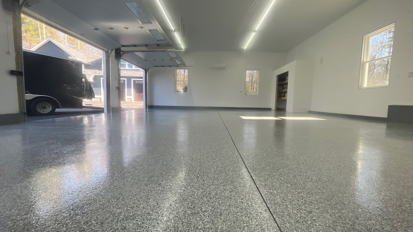 Garage in Londonderry, NH 03053 by Symphony Concrete Coatings
