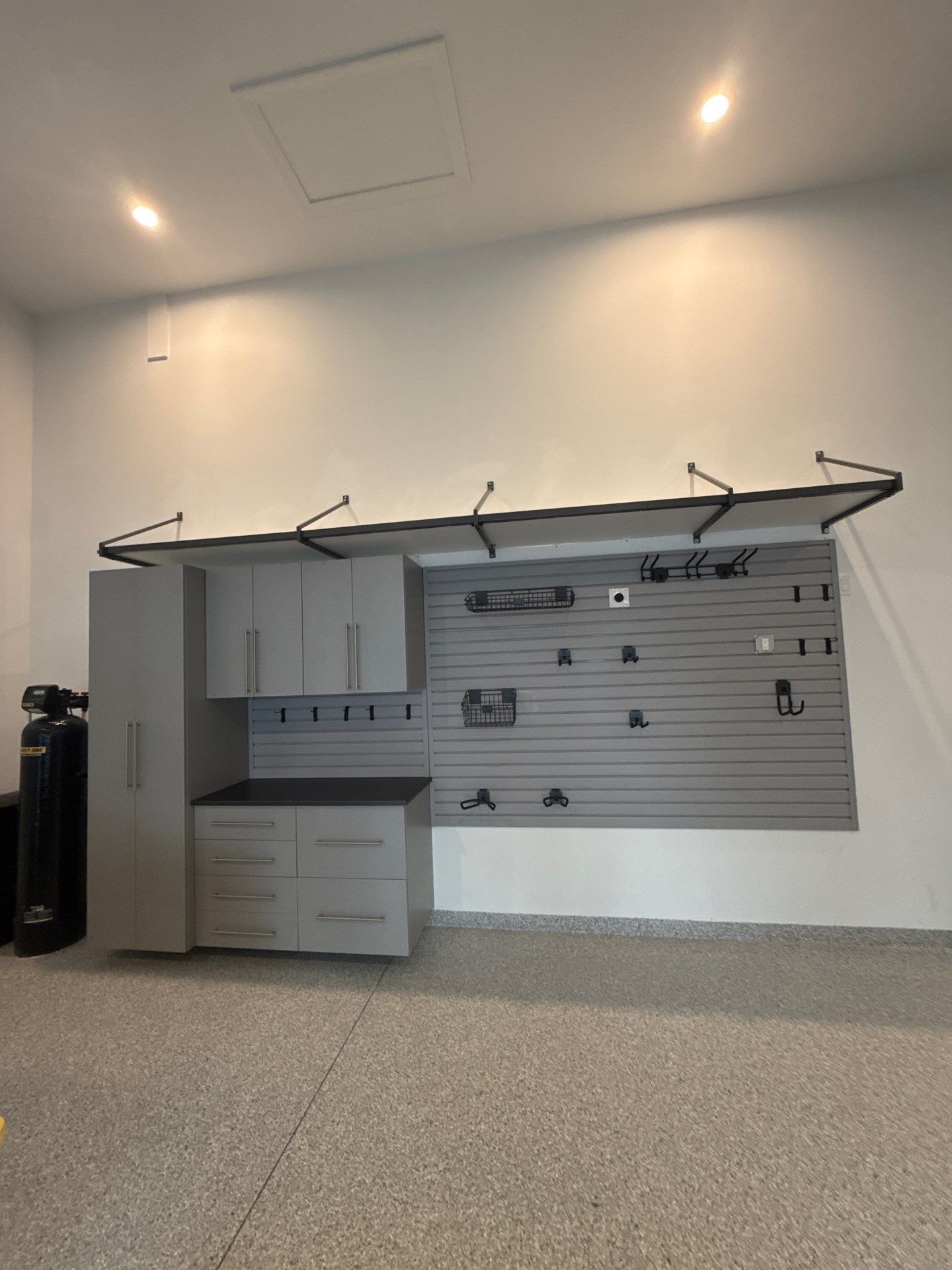 Custom Garage Storage Cabinets and Epoxy Floor Coating in Tampa by Square 1 Garage and Closet Solutions