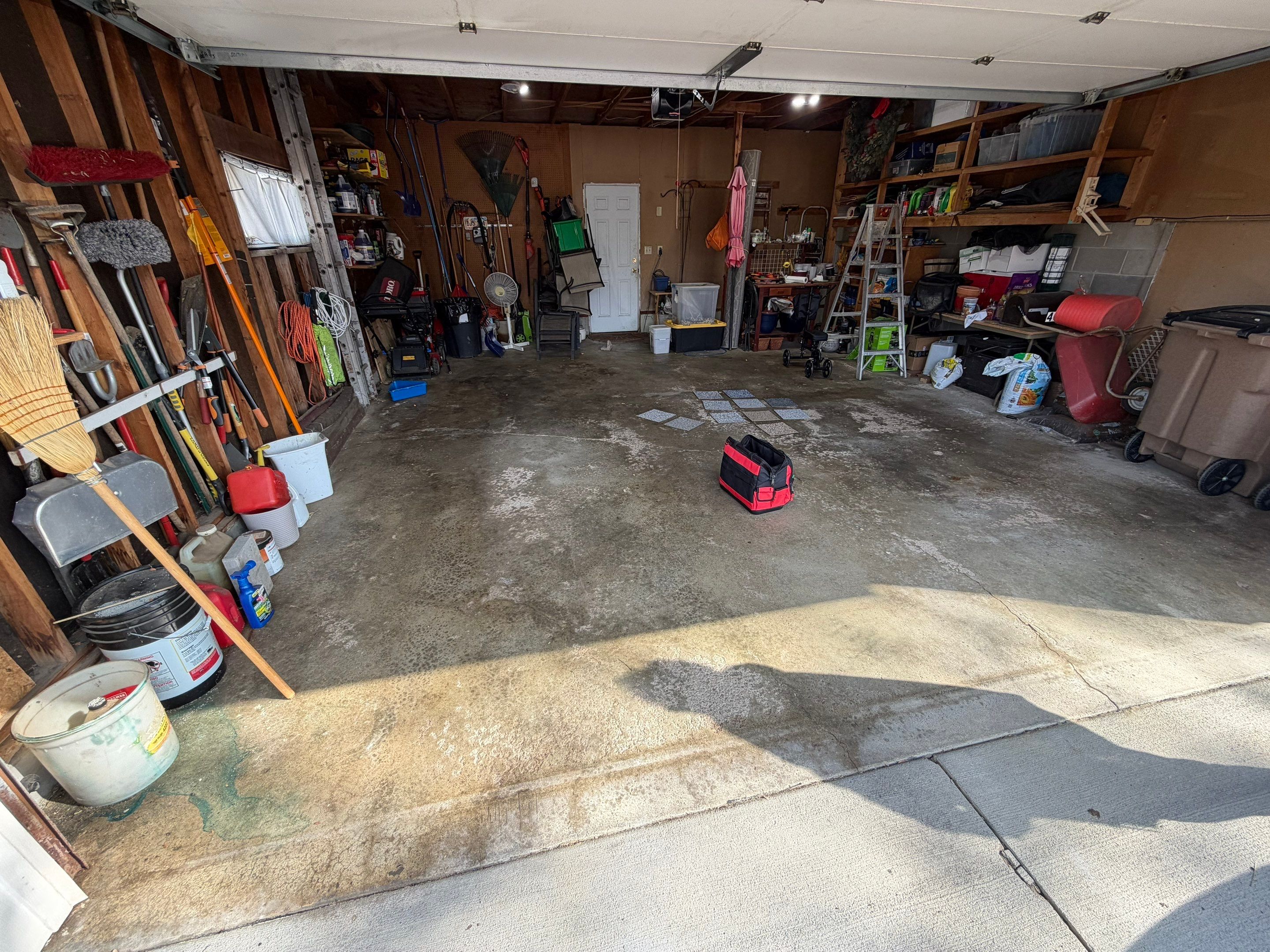 Sioux Falls Garage Epoxy Floor Installation and Concrete Crack Repair by Select Painting, Coatings & Garage Cabinets