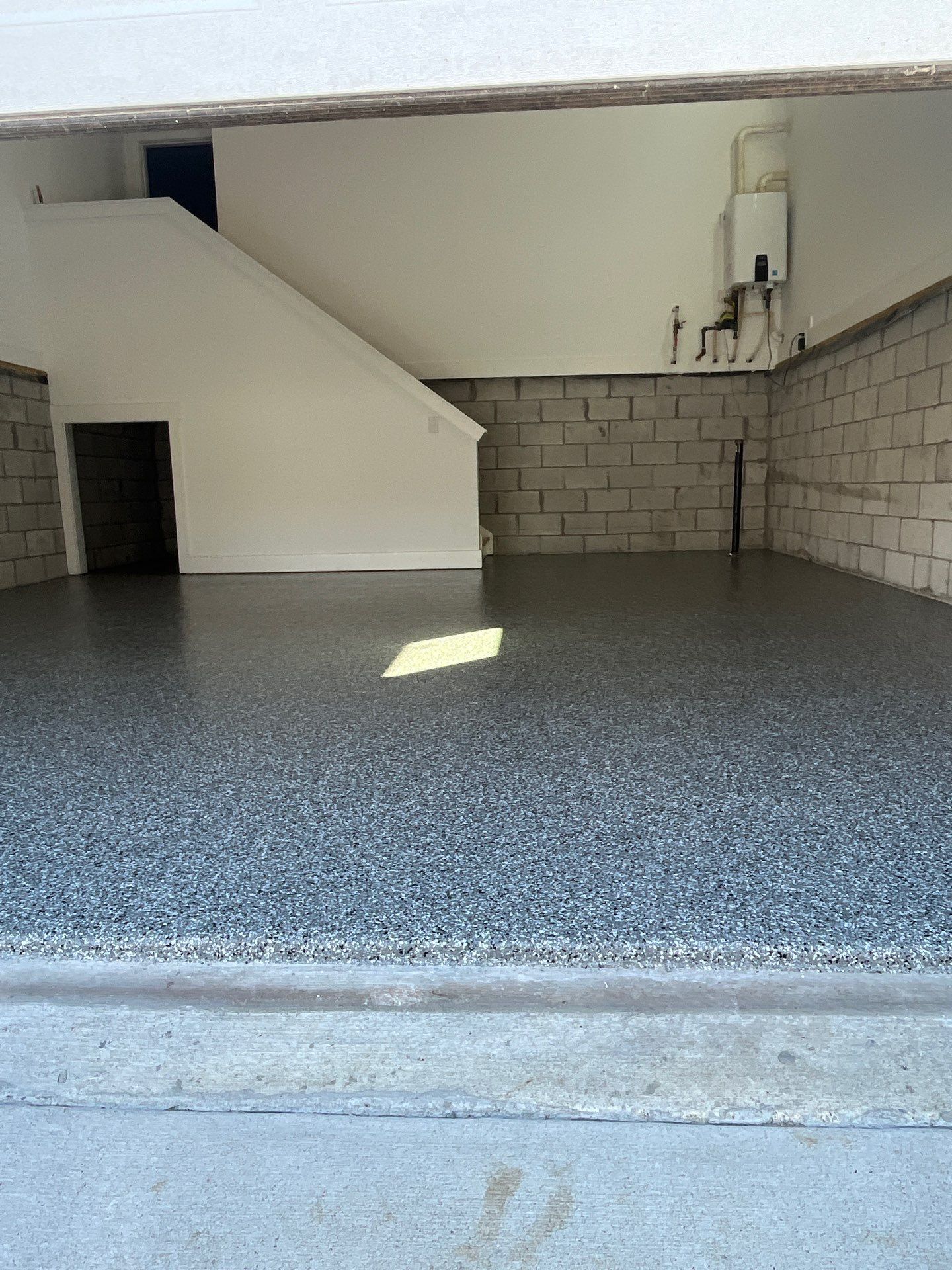 Garage Floor Coating using Wombat by My Garage Floor Guys