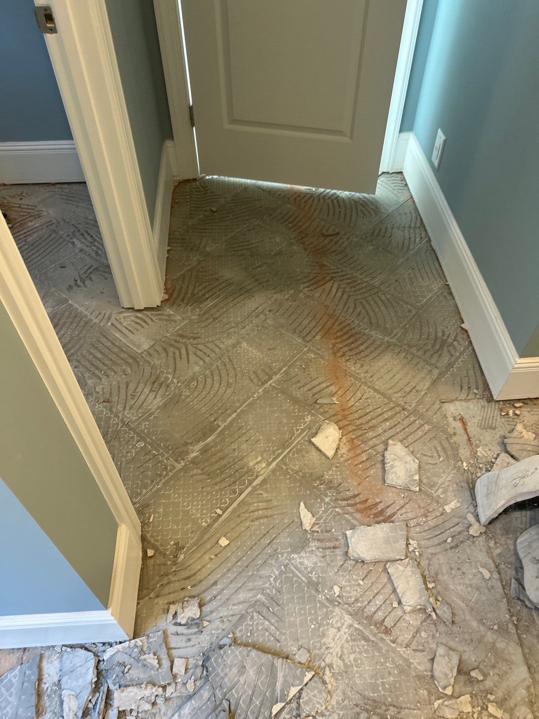 Master Bath Tile Repair  by Footprints Floors of Nashville