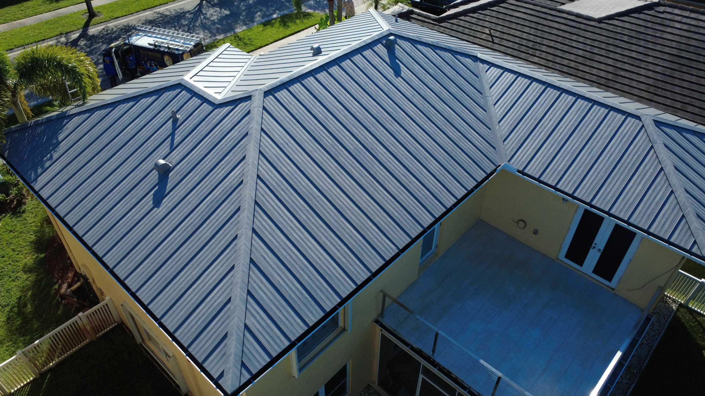 Residential Roofing Installation using 1" Nail strip metal roof by BLUES BROTHERS ROOFING