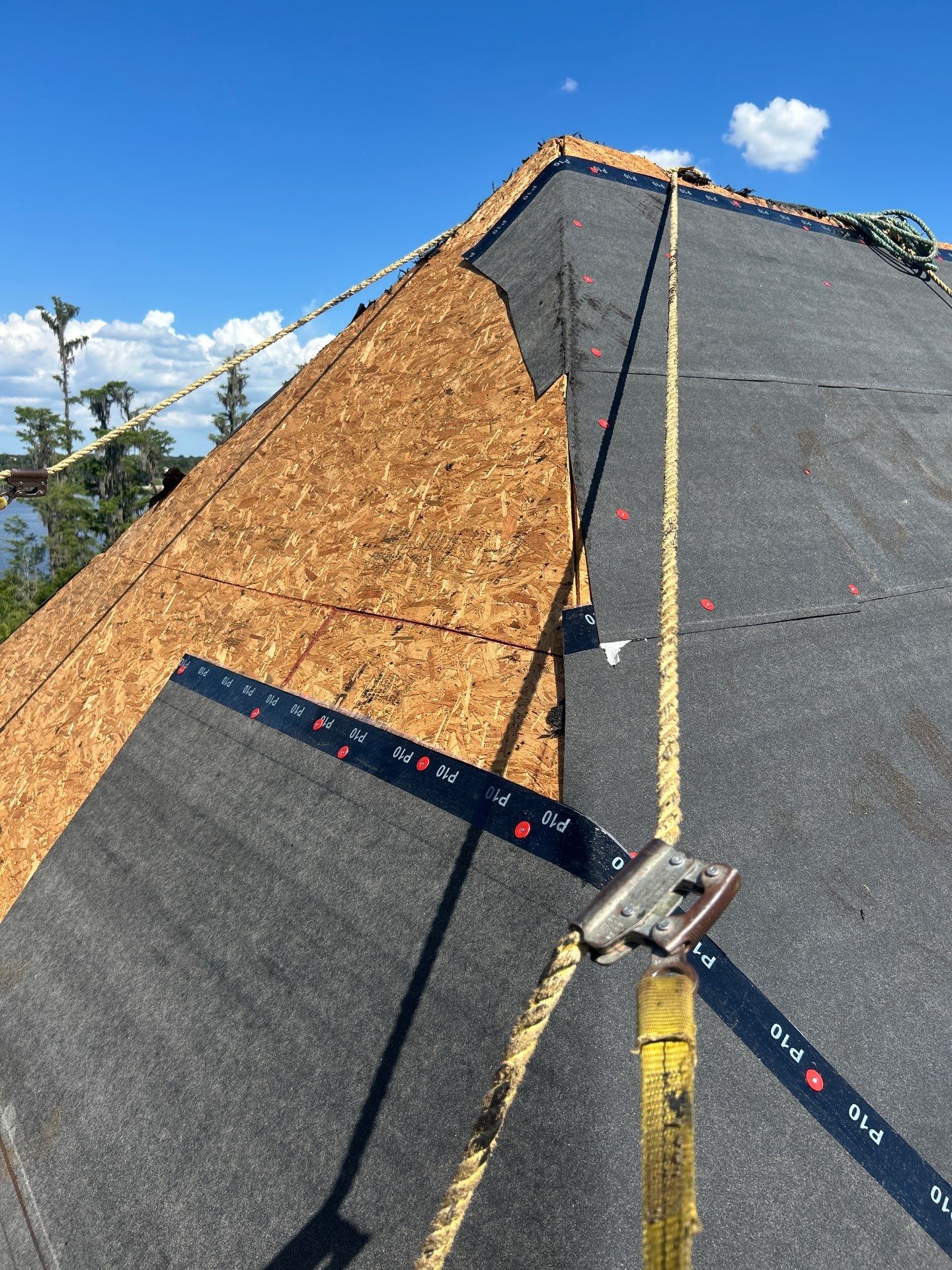 Residential Roofing Installation with Black Shadow Shingles in Clermont by Pinnacle Roofing Group