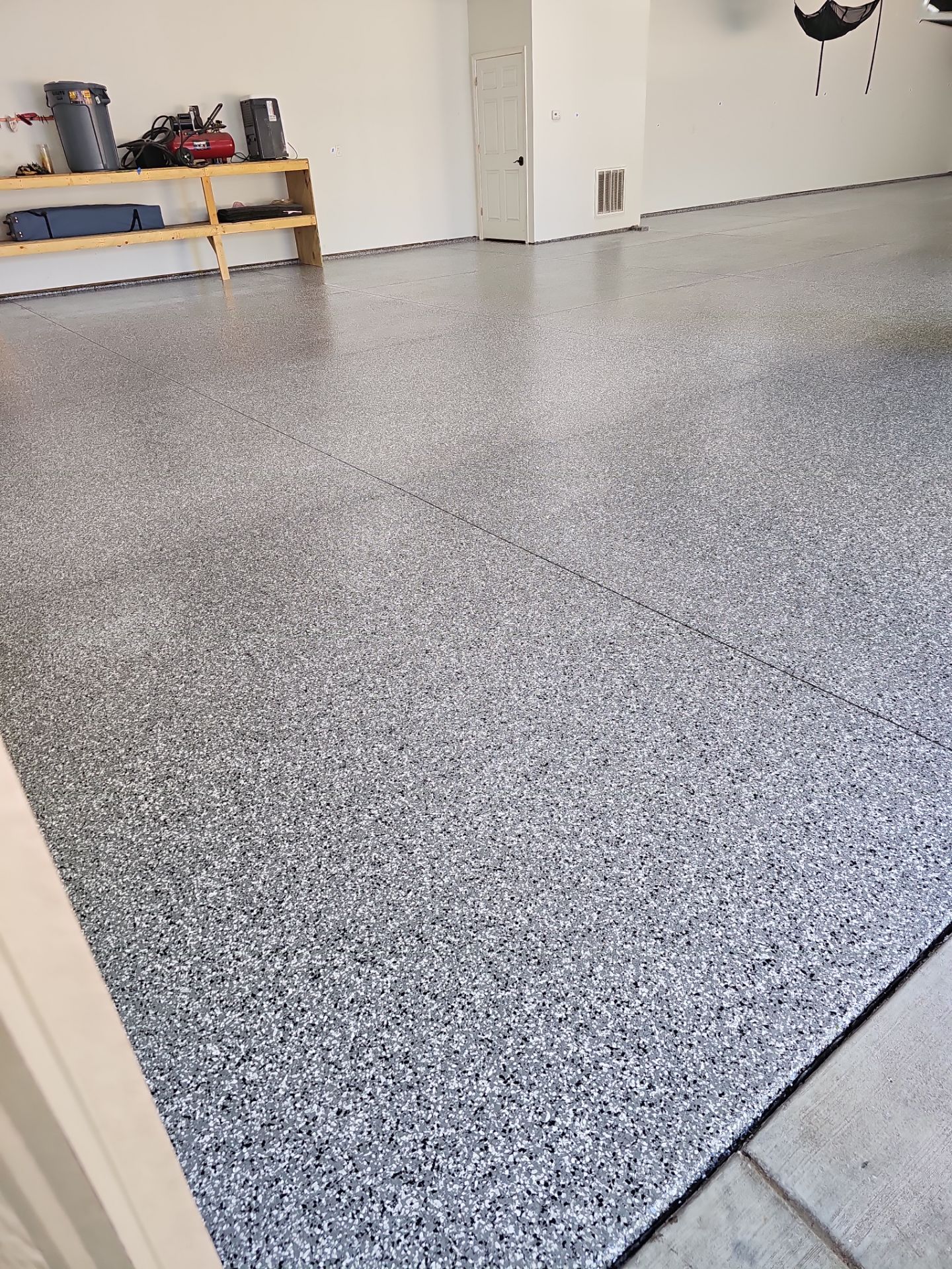 Smoke Garage Floor Coating in South Bend! by Innovative Spaces / Innovative Concrete Coatings