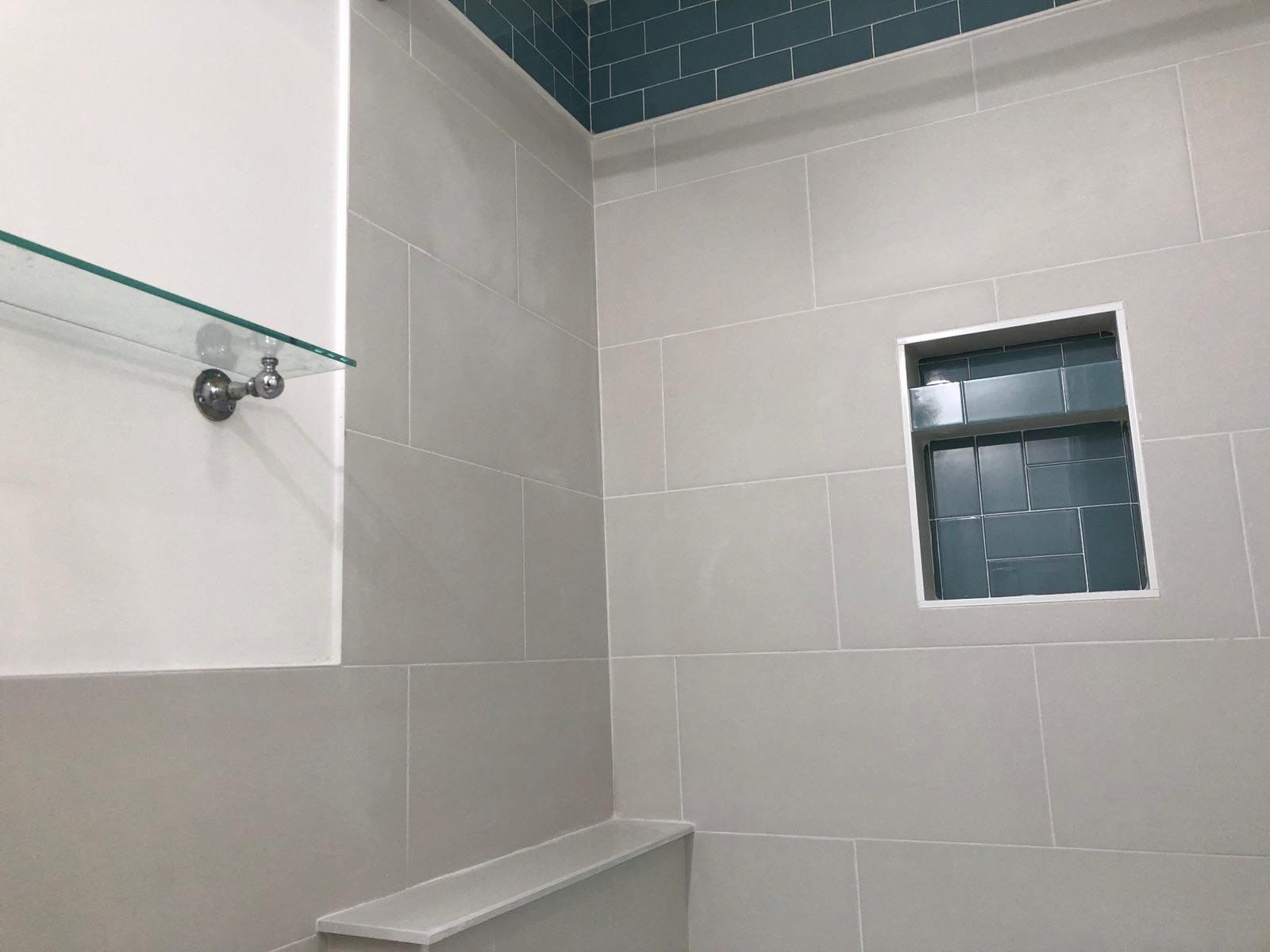 Bathroom Remodel using Tile by Home Concepts Construction