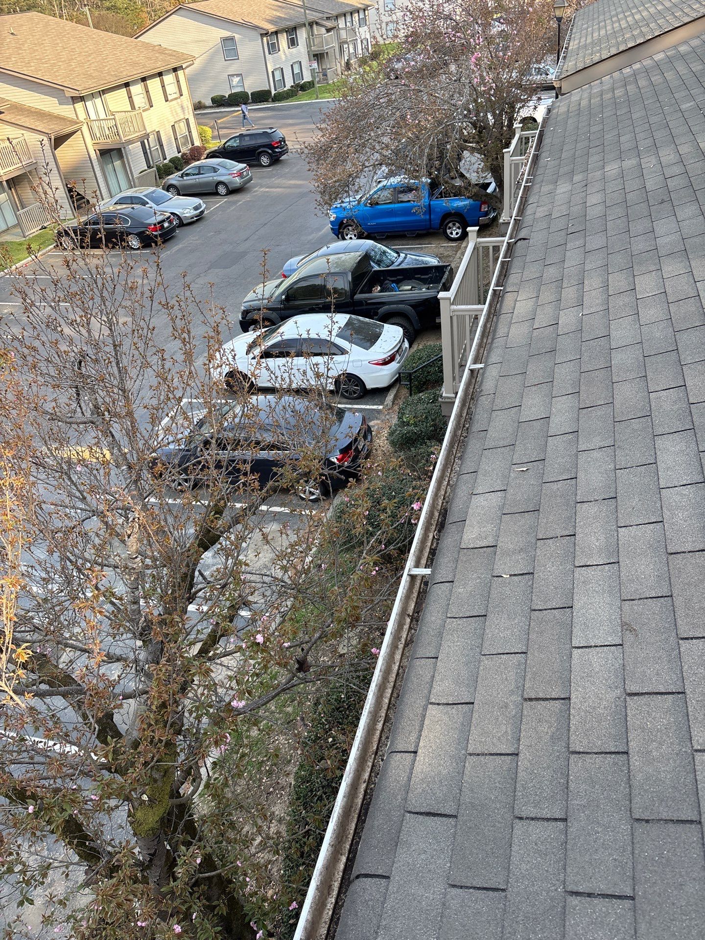 HOA gutter cleaning in Pinehurst & Southern Pines, NC, after  photo showing full gutters.