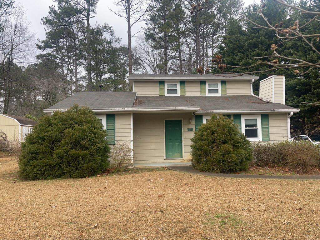 Marietta, GA Siding, Rotten Wood, Front Door, and Gutter Replacement with Exterior Painting by Nelson Exteriors