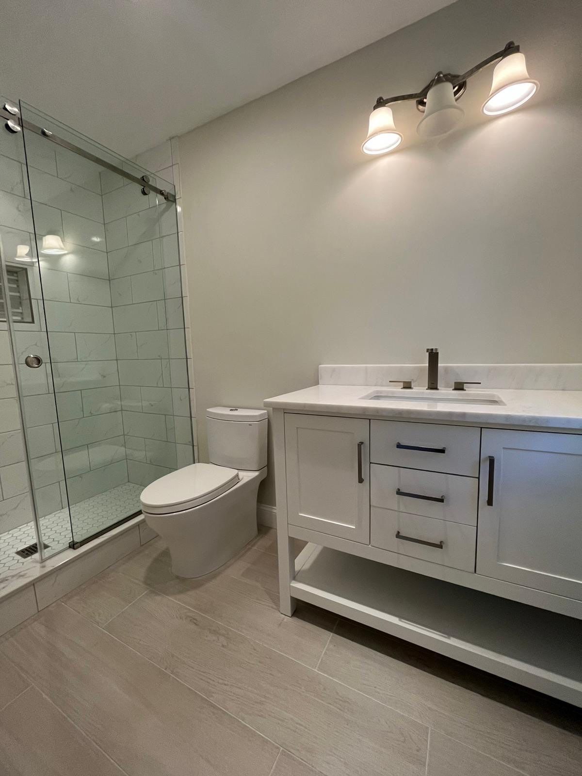 Bathroom Remodel using Tile by Home Concepts Construction