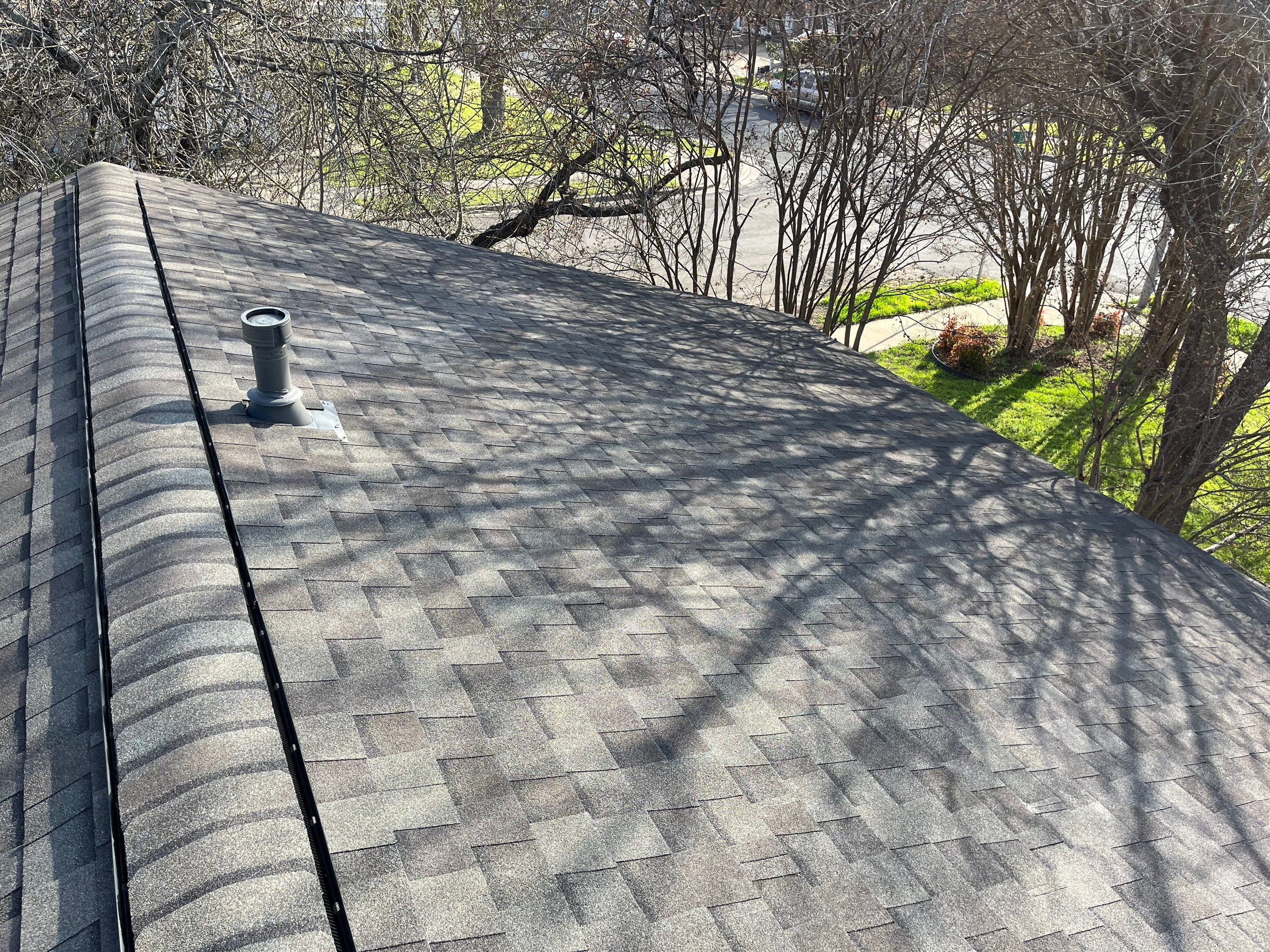 Estate Gray Shingles by Reimagine Roofing