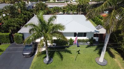 Residential Roofing Installation using 1" Nail strip metal roof