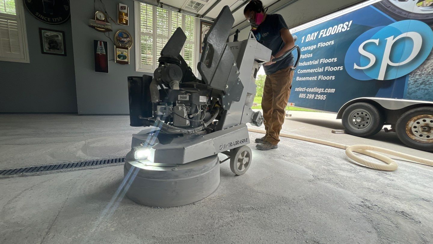 Garage using Orbit by Select Painting, Coatings & Garage Cabinets