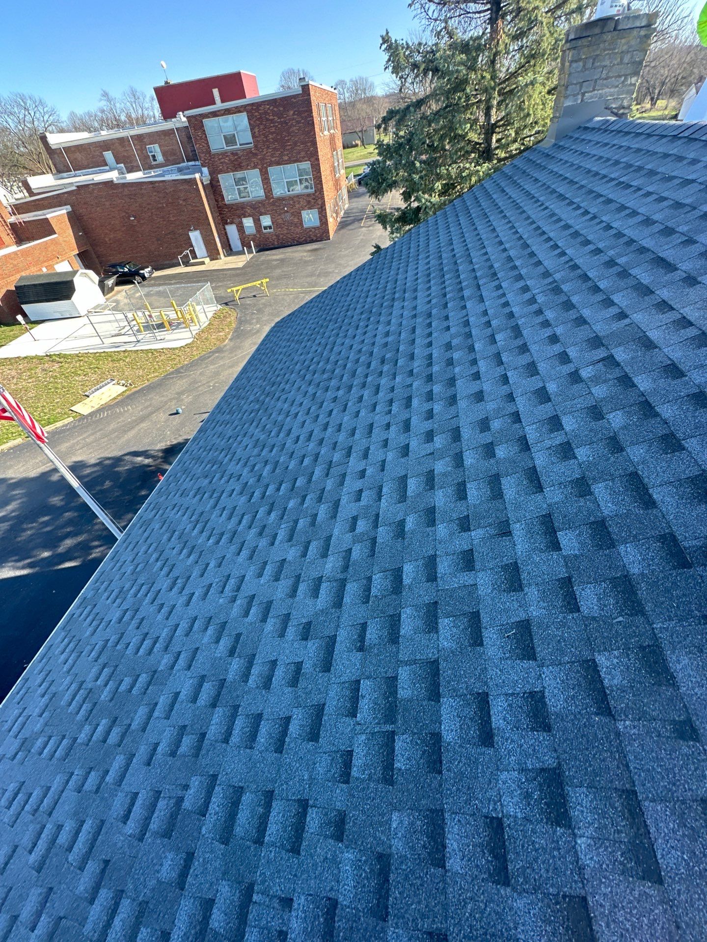 Commercial Roofing Installation using Timberline HDZ Shingles - Pewter Gray by RoofX 