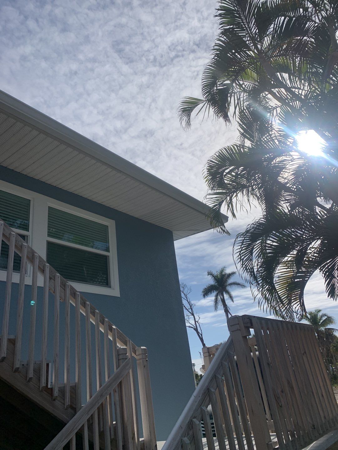 Downspout Installation for Two-Story Home in Fort Myers FL by Gutter Professor by Gutter Professors