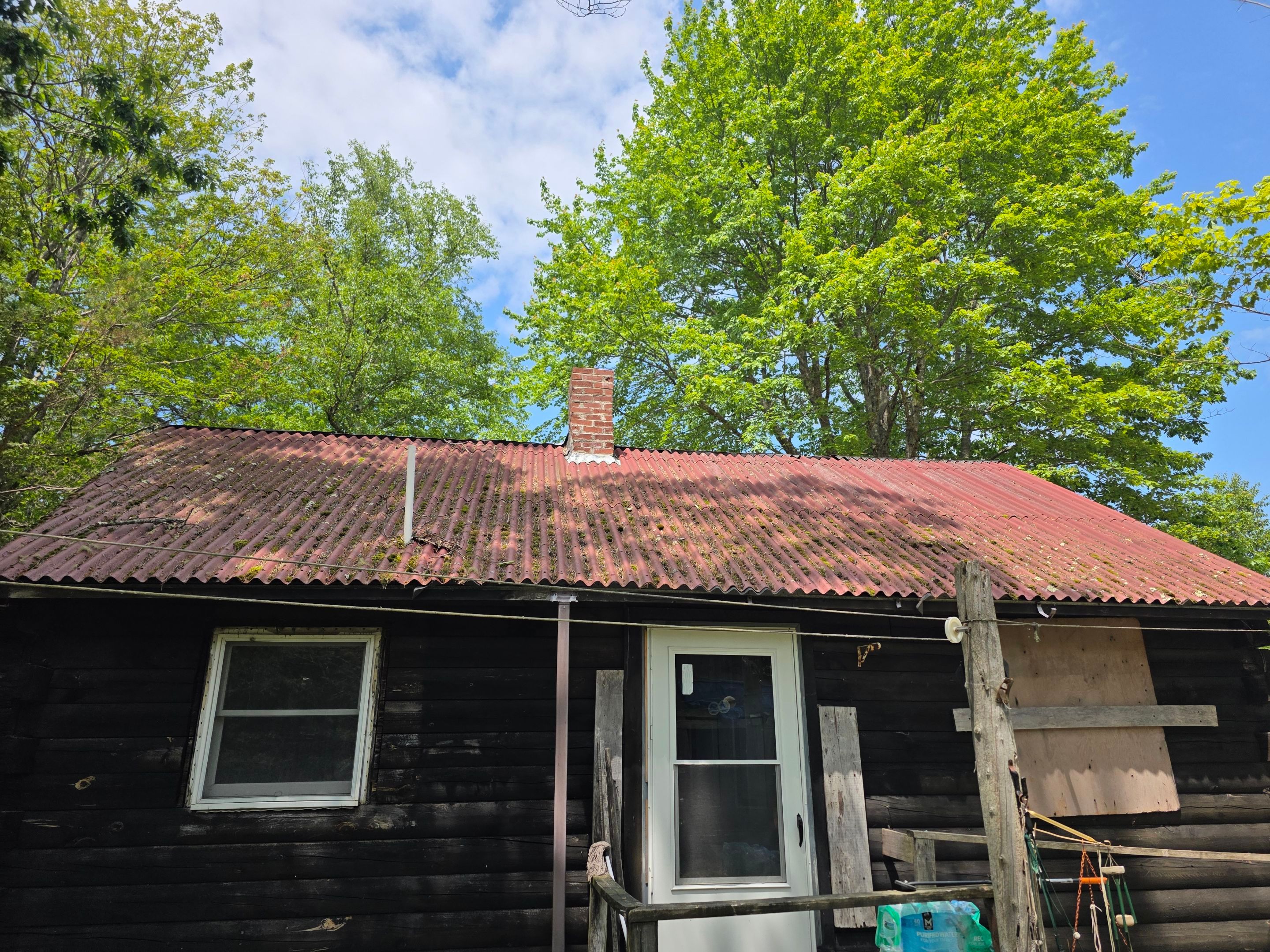 Cabin In the Woods by The B.A.R Roofing