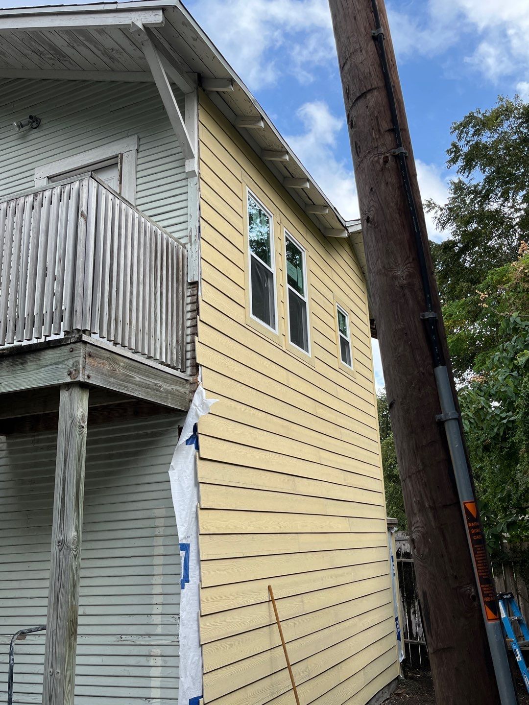 Up Town, Up Class by Bayfront Roofing and Construction