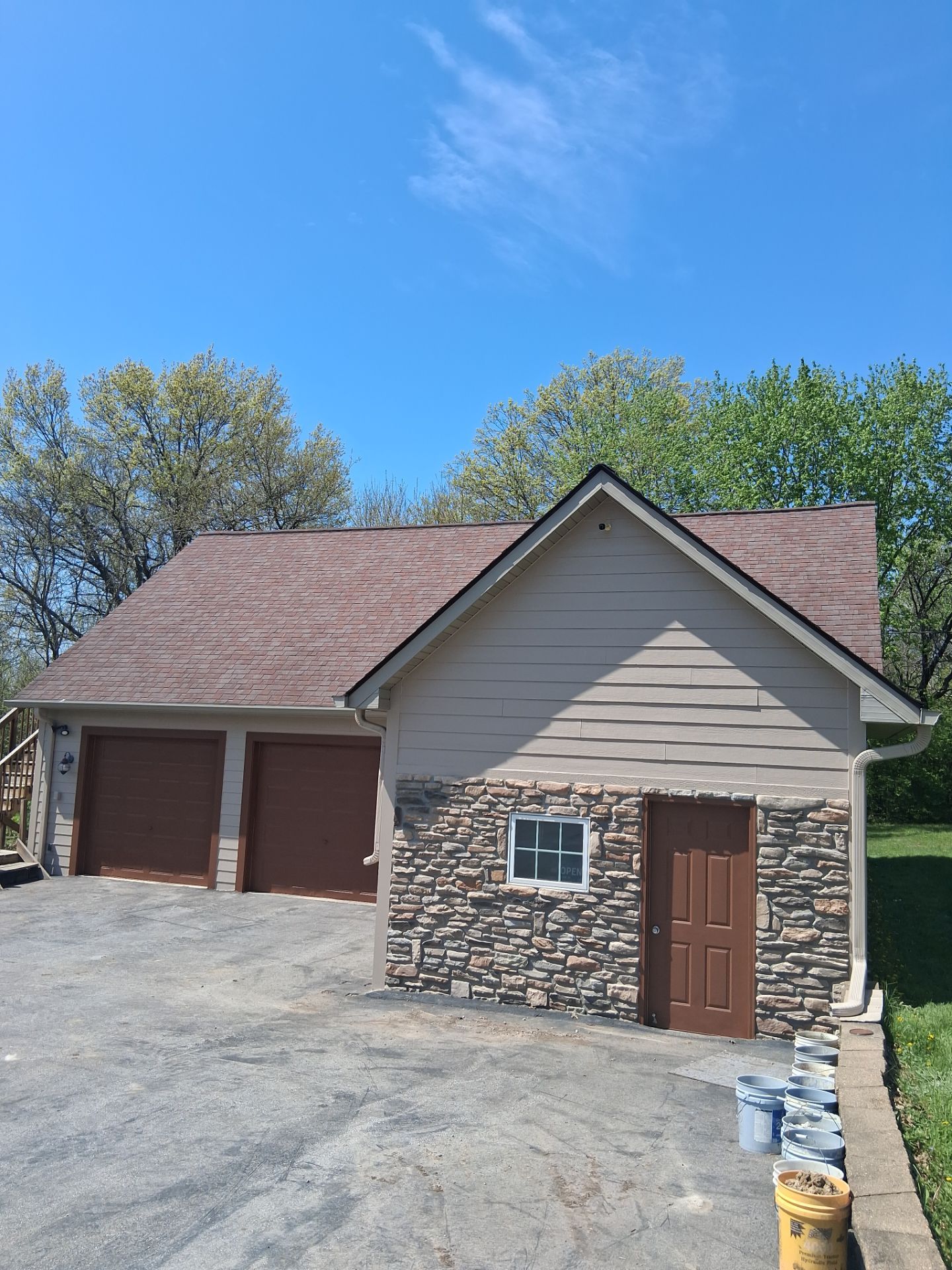 Residential Exterior Repaint Including Shop and Shed  by Midwest Paint LLC