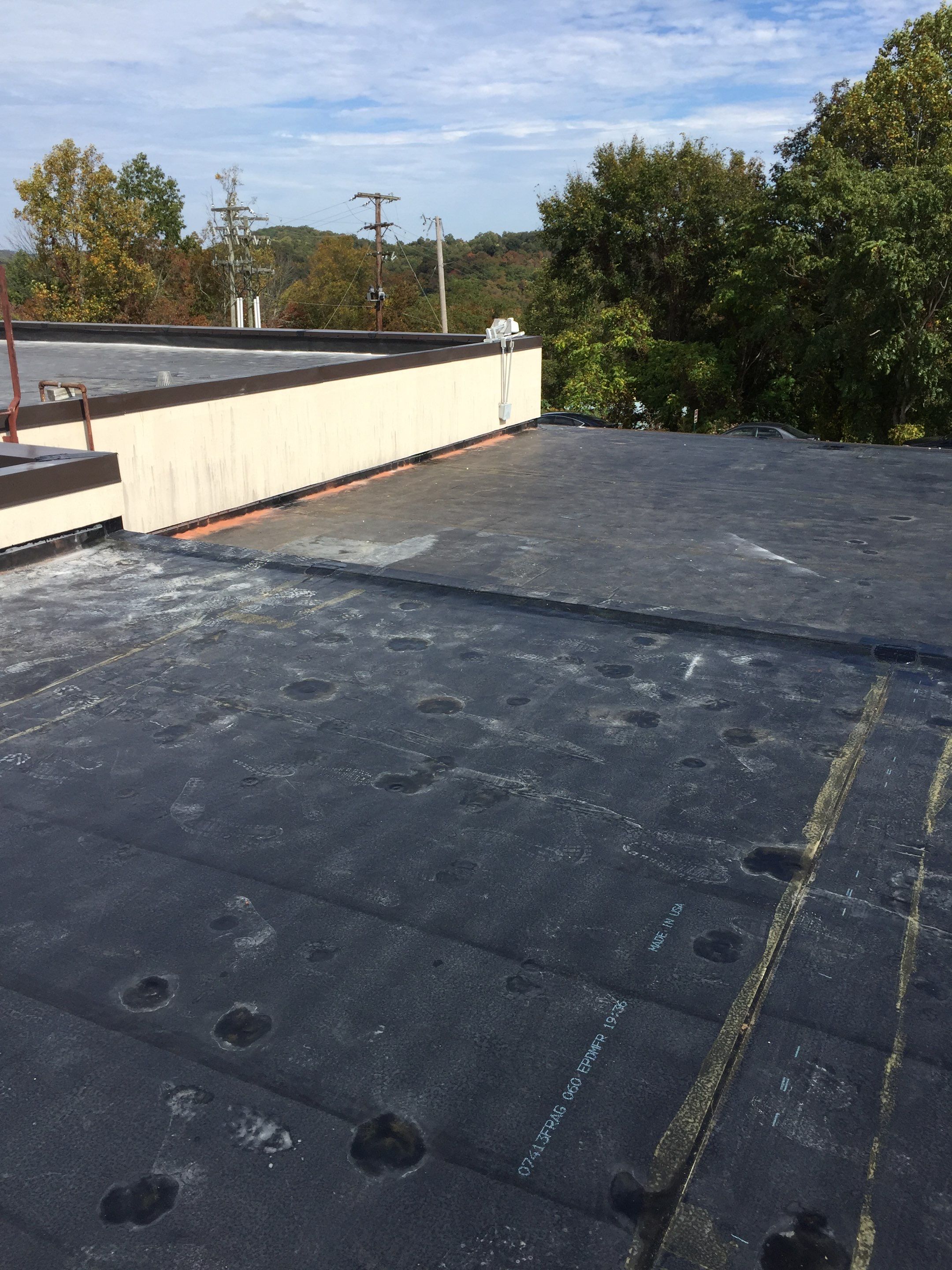Commercial Rubber Roofing  using Carlisle Rubber Roofing System by Secure Construction Company Inc
