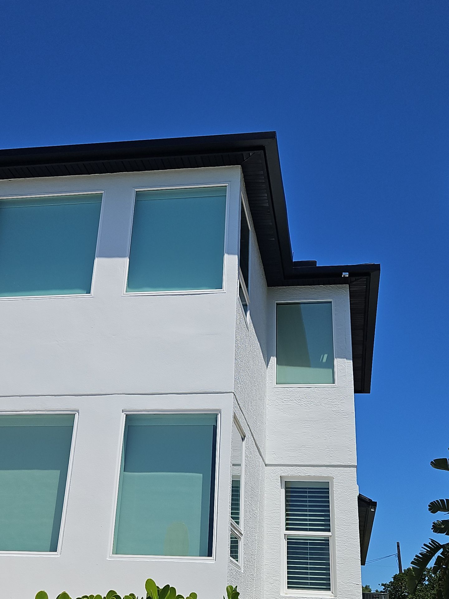Soffit and Fascia Installation and black seamless gutters in Sarasota FL by Gutter Professors