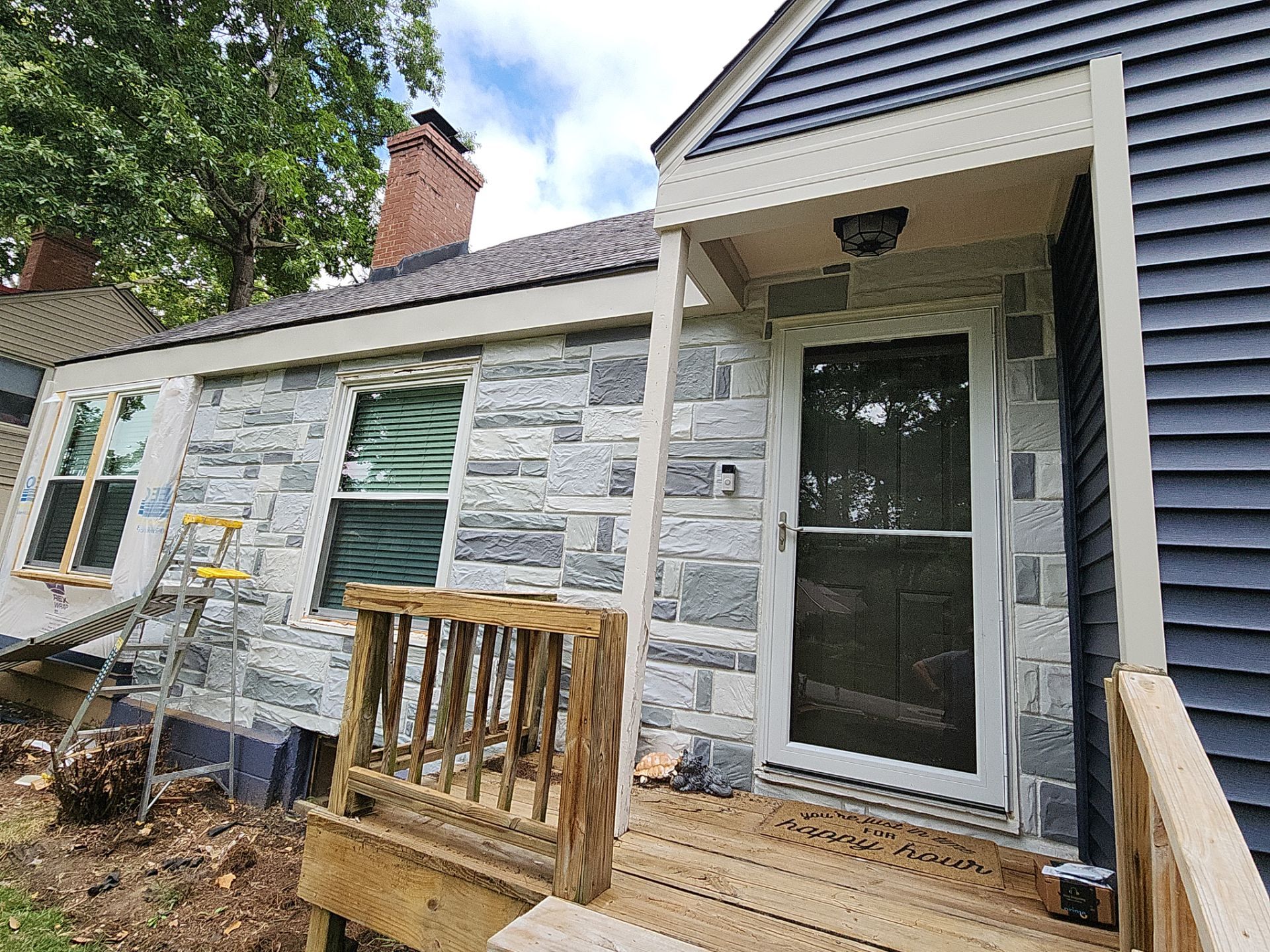 Kansas City Indigo Insulated Craneboard Siding and Window Replacement Project in Kansas City by EEC Windows, Siding & Roofing