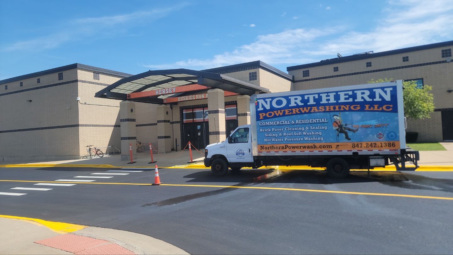 commercial pressure washing using Algaecide, soft wash soap by Northern Power Washing LLC.