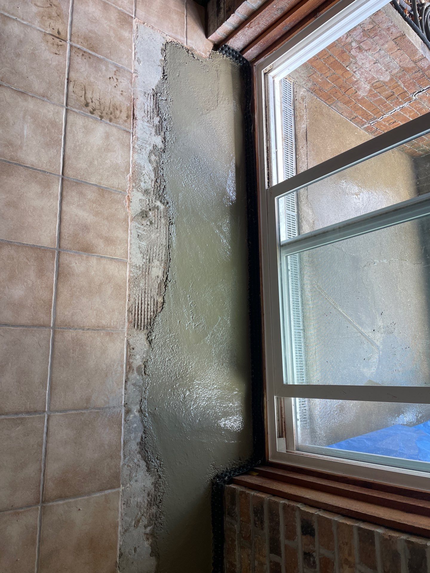 Interior Drain Tile System in Elwood by Area Wide Waterproofing