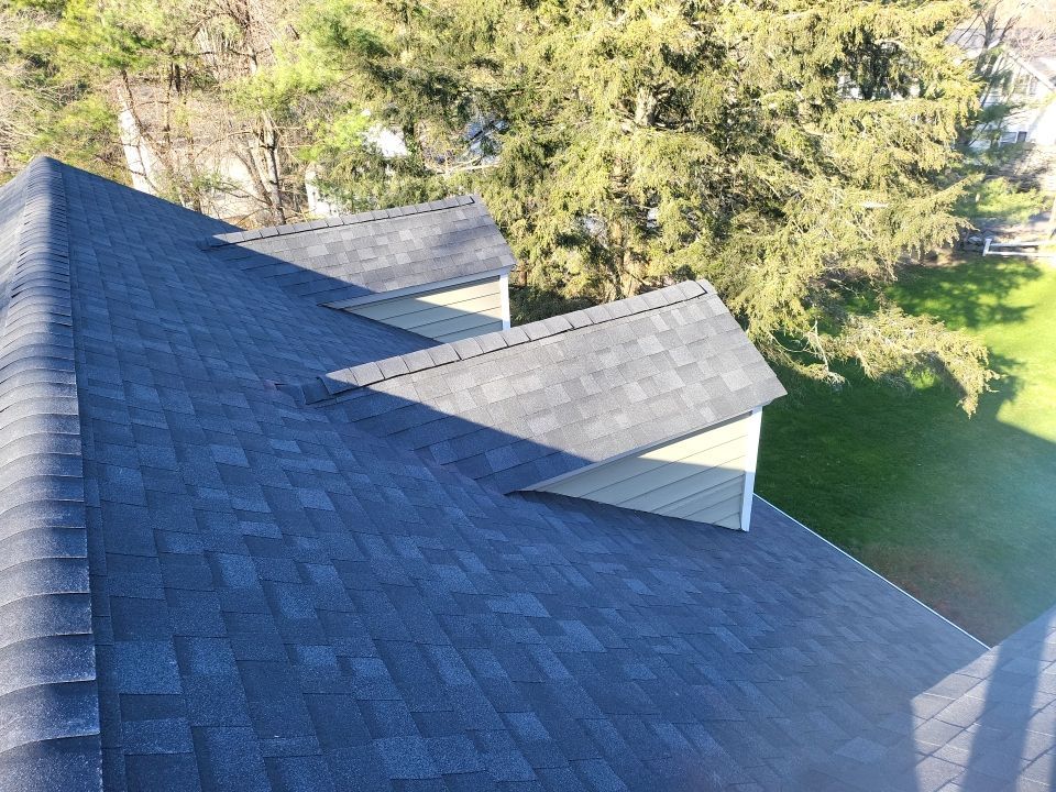 Residential Roofing Installation using onyx black by A Plus Exterior