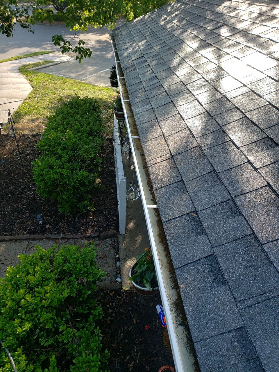 Gutter Cleaning using water by Power Wash Masters LLC