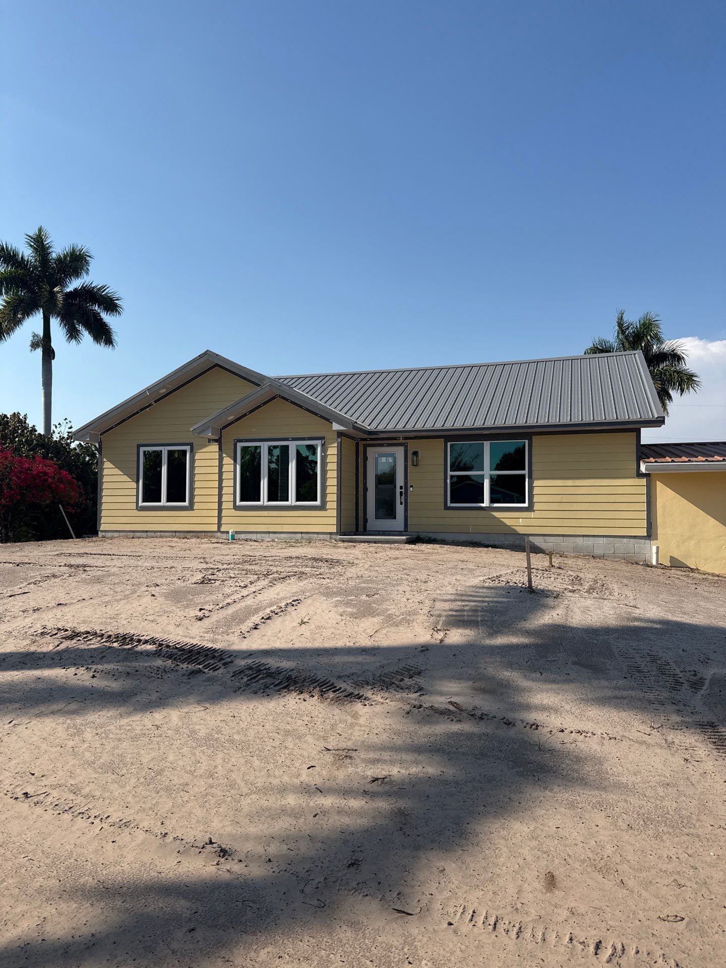 Musket Brown Seamless Gutters Installation in Saint James City, FL  by Gutter Professors