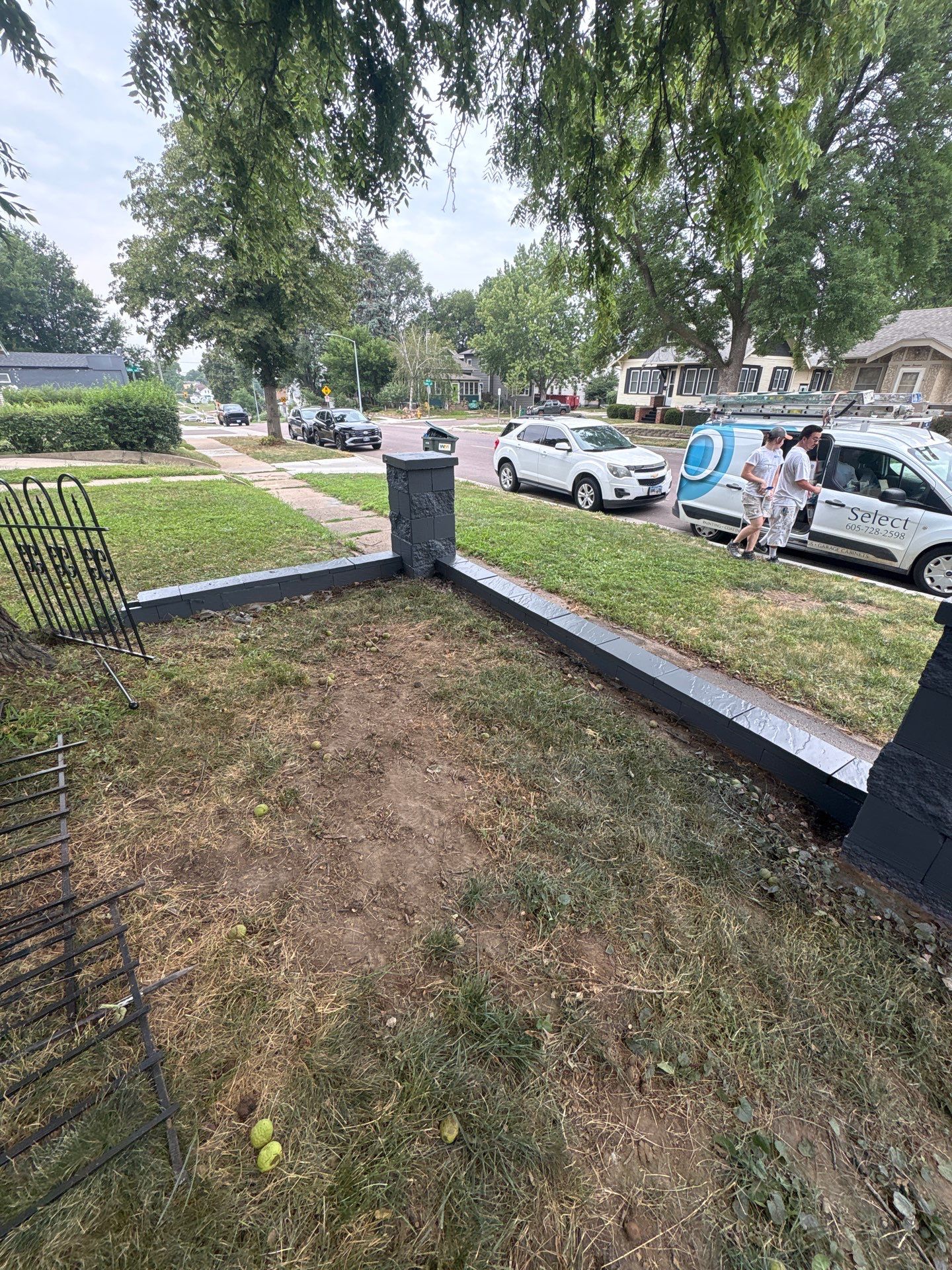 Exterior Masonry Painting for a Sioux Falls Retaining Wall by Select Painting, Coatings & Garage Cabinets
