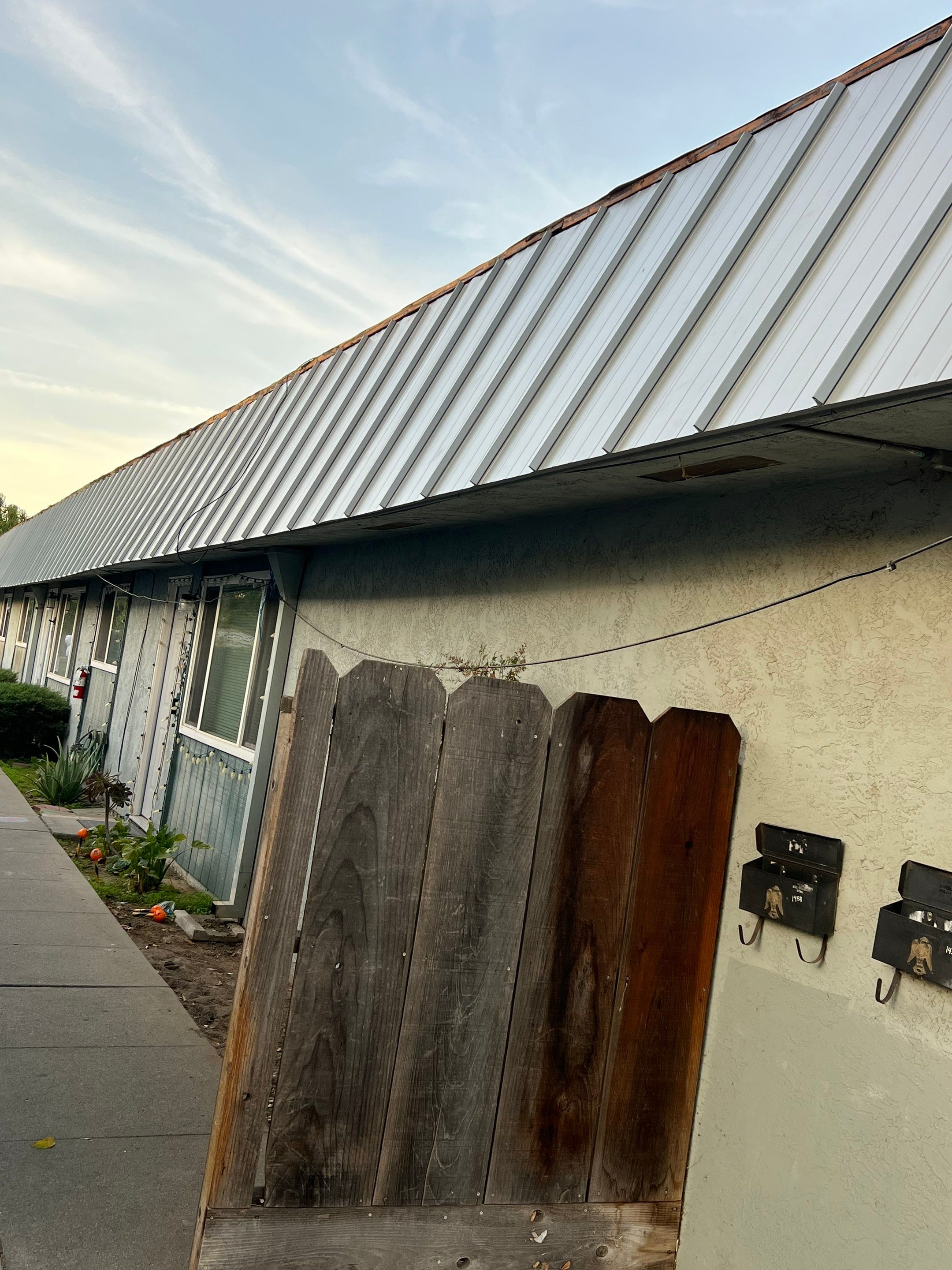 Foam Refurbish using Conklin Benchmark/PUMA XL coatings and spray foam; Also metal roofing around parapet wall by Straight Edge Roofing Inc