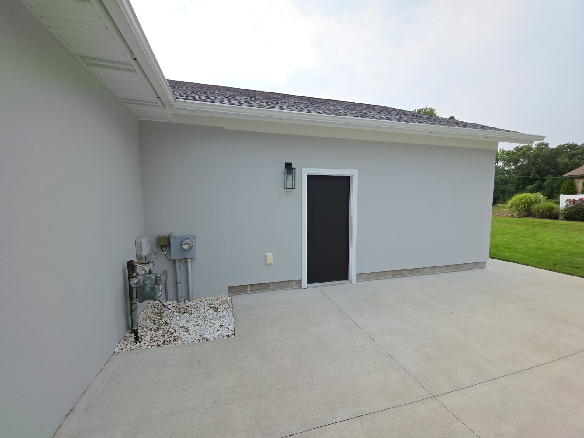 Norton Shores Residential Stucco Repair and Exterior Painting Refresh by Gordon Painting