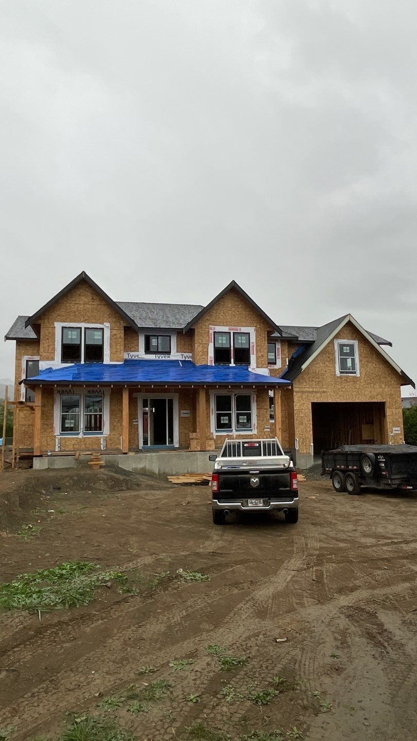 Residential Roofing Installation using OC Oakridge shingles with prolok accent roofs by Top Notch Roofing Inc