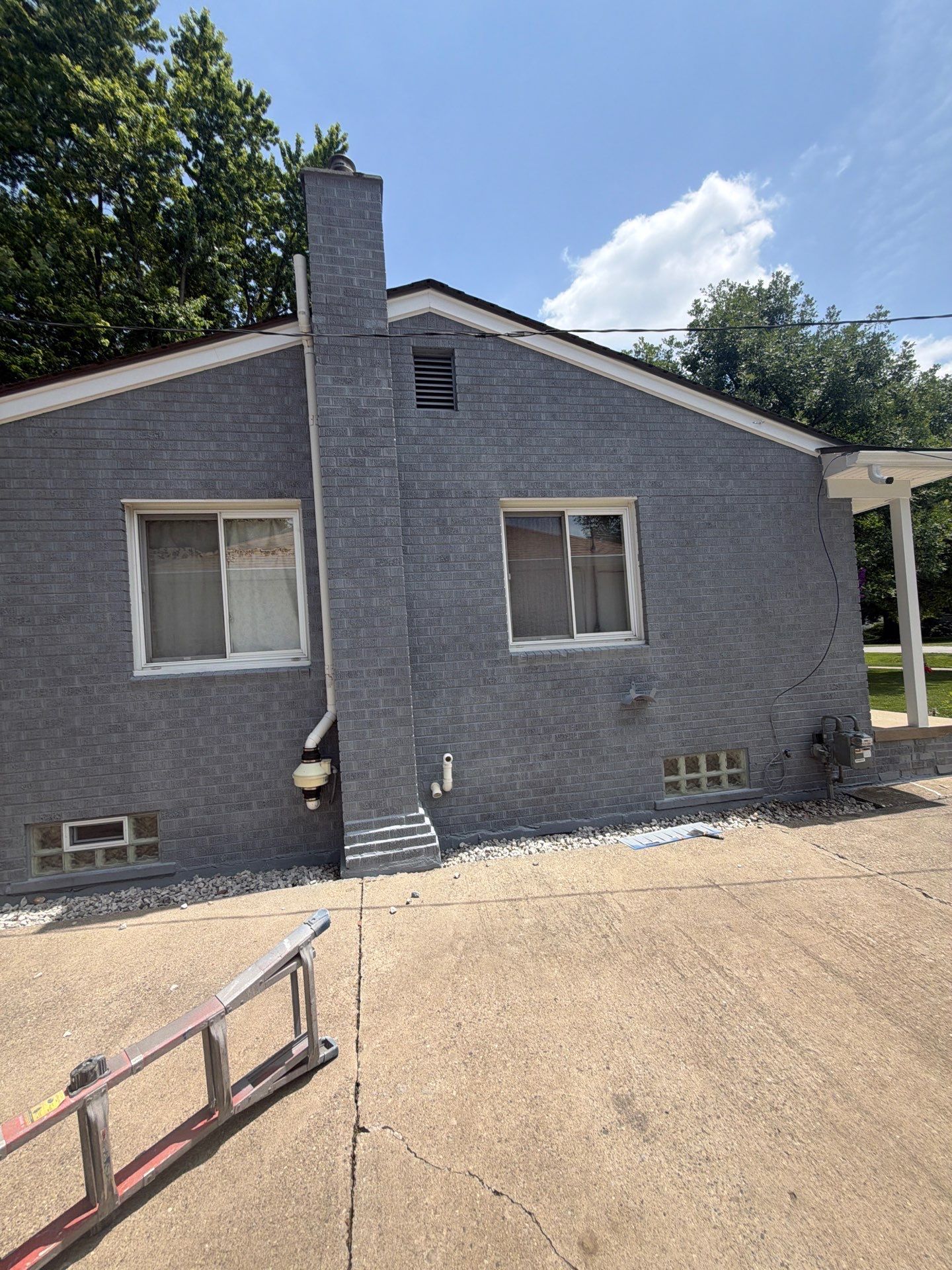 Exterior Brick Staining Transformation by Top Shelf Painter